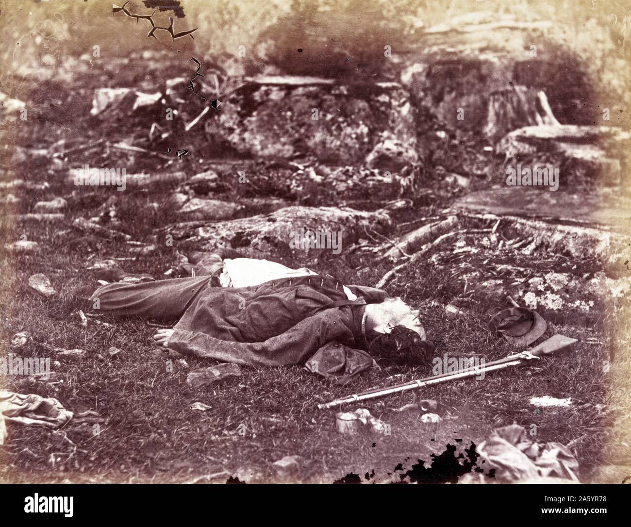 Photomechanical print of a deceased sharpshooter during the Battle of Gettysburg. The Battle of Gettysburg lasted from July 1ñ3, 1863, in and around the town of Gettysburg, Pennsylvania, by Union and Confederate forces during the American Civil War. Photographed by Alexander Gardner (1821-1882) Scottish photographer who emigrated to the United States. Dated 1863 Stock Photo