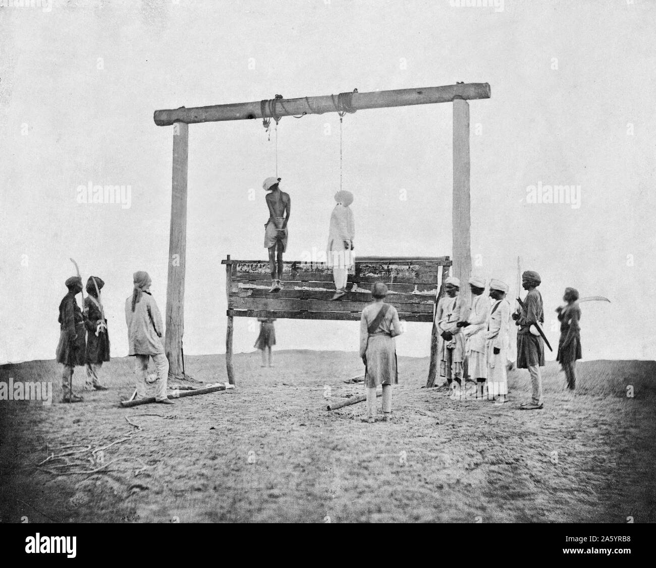 The Hanging of Two Rebels, the Indian Mutiny, 1858. India's First War for Independence began as a mutiny of sepoys of the East India Company's army on 10th May, 1857, in the cantonment of the town of Meerut, and soon escalated into other mutinies and civilian rebellions largely in the upper Gangetic plain and central India with the major hostilities confined to present-day Uttar Pradesh, Bihar, Northern Madya Pradesh and the Delhi region. Stock Photo