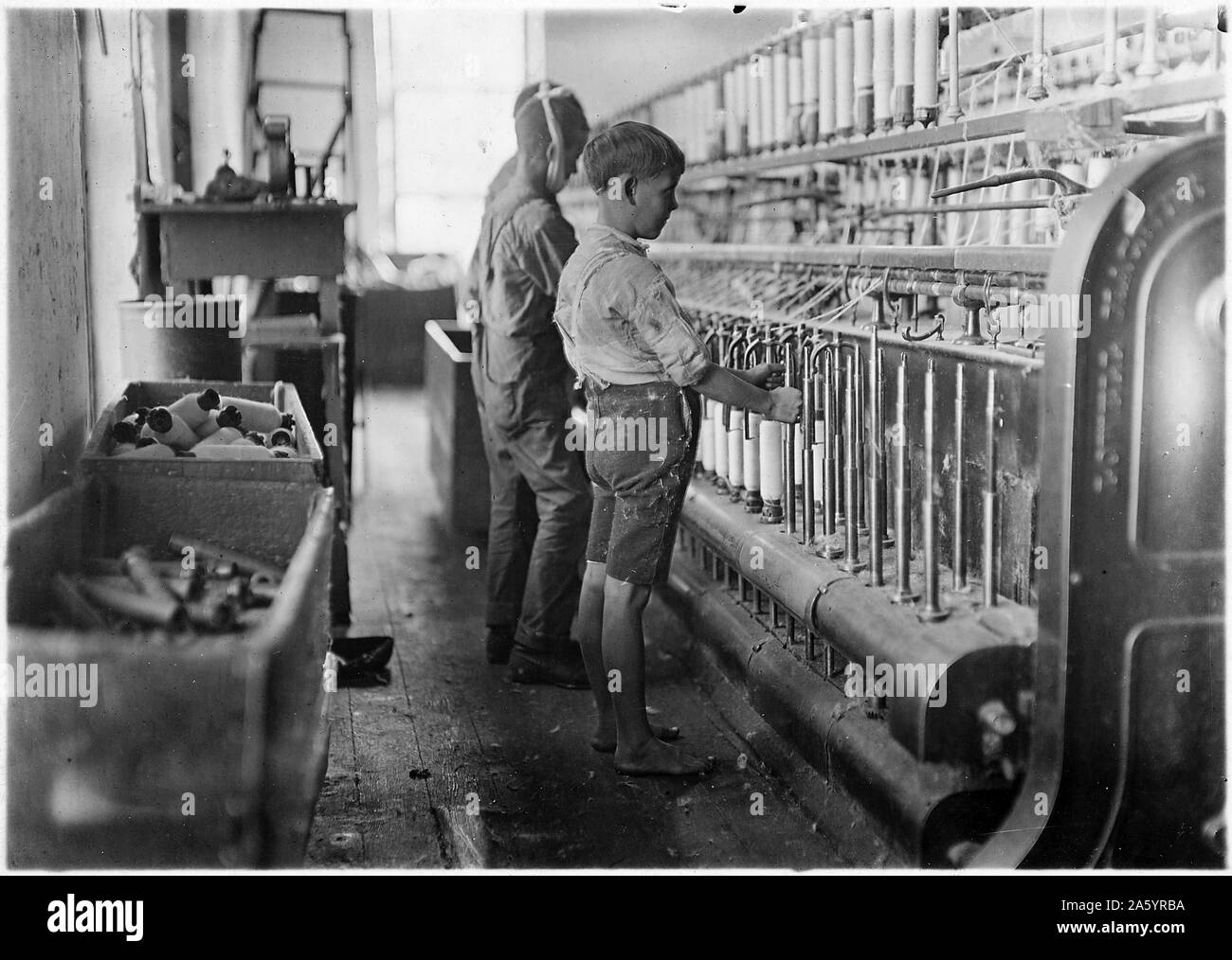 Doffers (Child labour) in a textile factory, in Cherryville, North Carolina, USA. 1910 Stock Photo