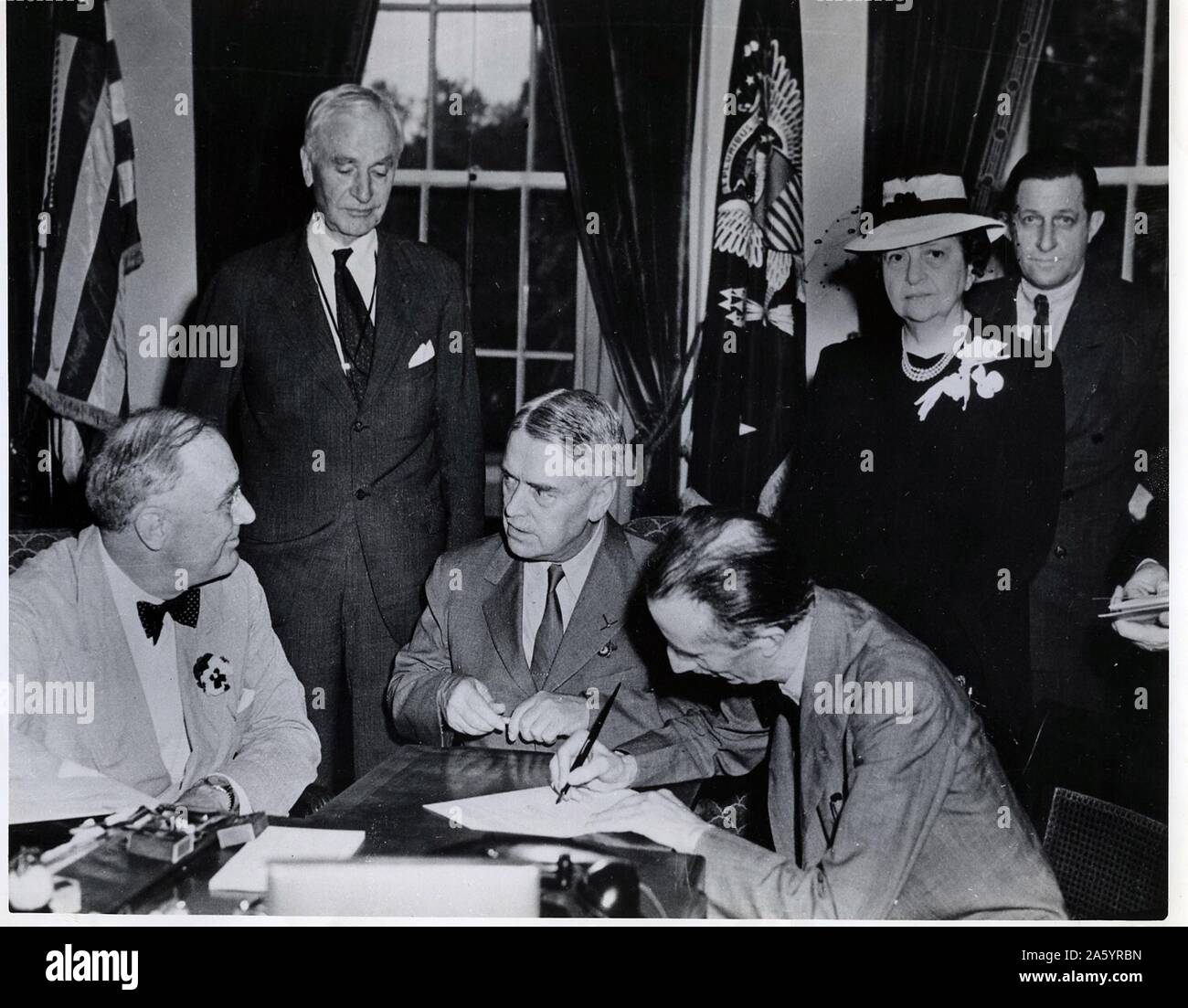 The signing of the Declaration of Philadelphia took place at the White House, Washington DC, on 17 May 1944. Seated, left to right; US President Franklin Delano Roosevelt, Walter Nash, E.J. Phelan. Standing, left to right: US Secretary of State Cordell Hull, US Secretary of Labour Frances Perkins, ILO Assistant Director Lindsay Rogers. Stock Photo