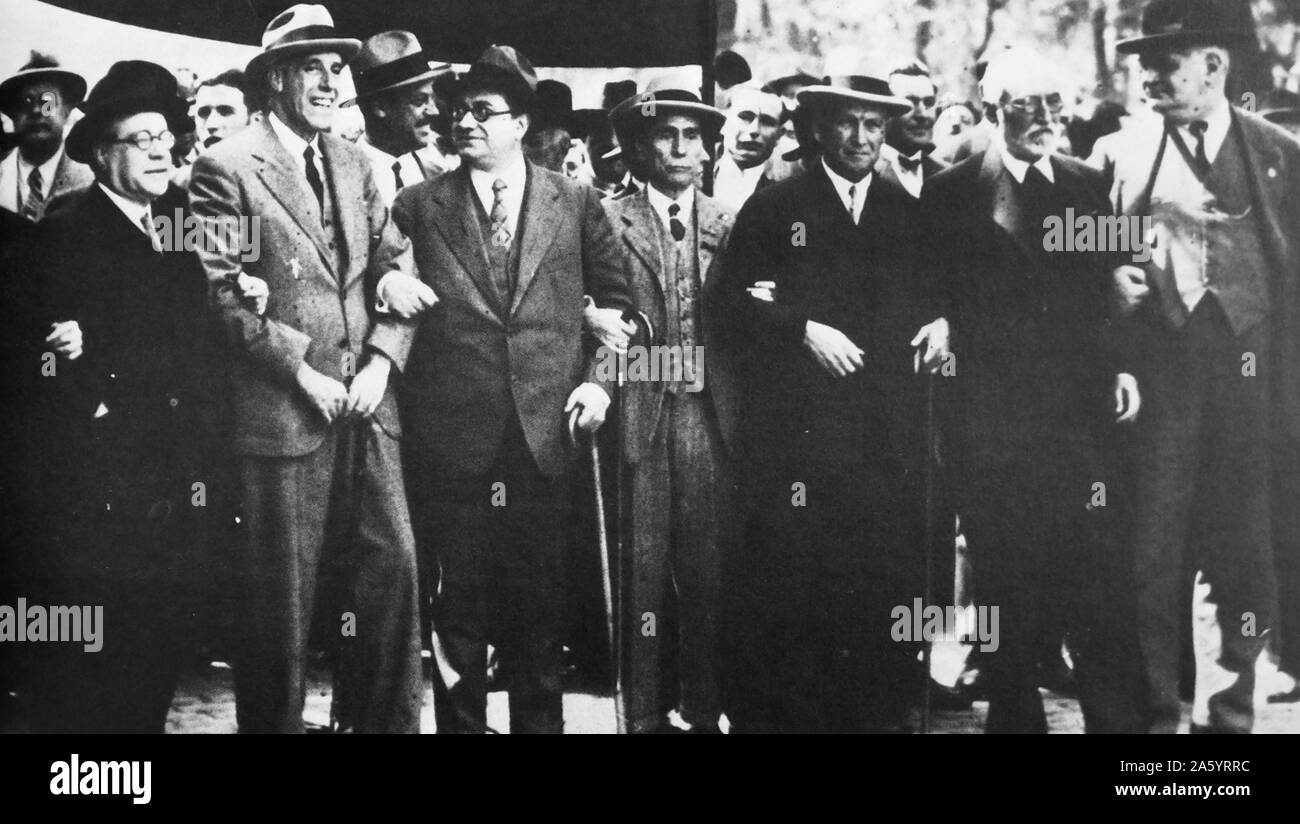 Julián Besteiro Fernández (tallest man with hat at centre), and Indalecio Prieto Tuero (30 April 1883 – 11 February 1962), join socialist leaders at a march in Madrid 1931 . Stock Photo
