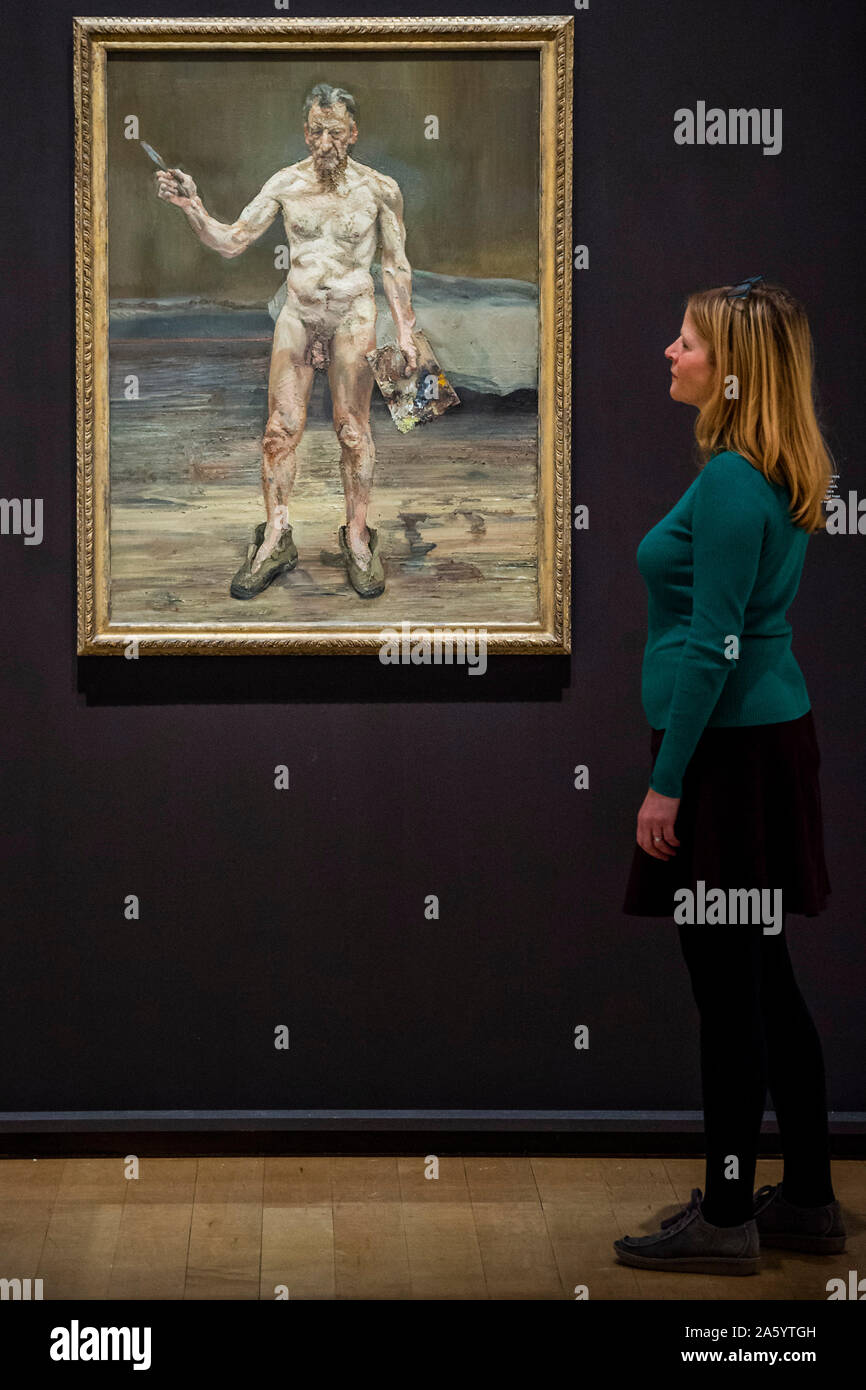 London, UK. 23rd Oct, 2019. Painter Working, reflection, 1993 - Lucian Freud self-portraits at the Royal Academy of Arts. Executed over almost seven decades on canvas and paper, the exhibition brings together 56 works that chart Freud’s artistic development. Credit: Guy Bell/Alamy Live News Stock Photo