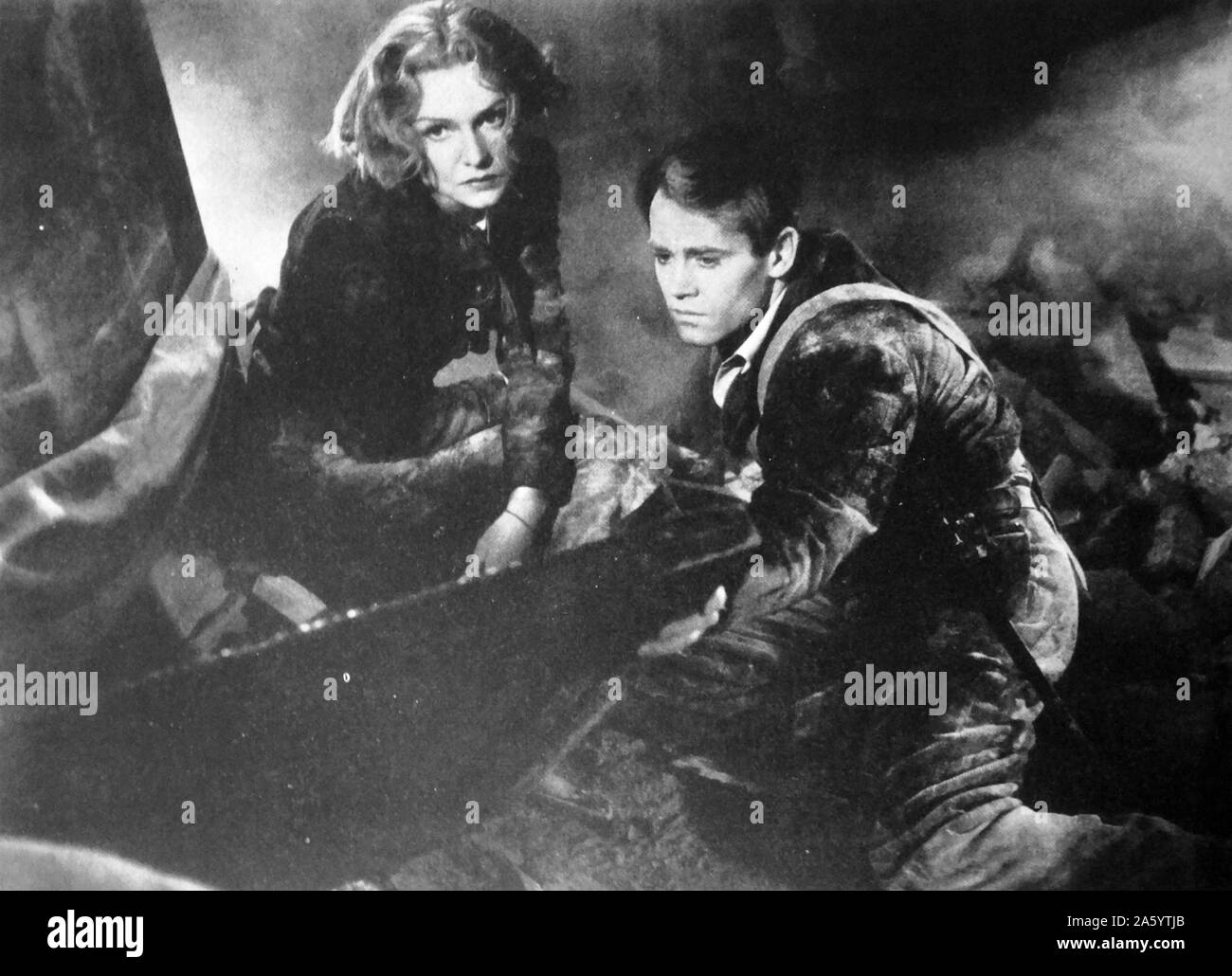 Film still from 'Blockade' a 1938 American film directed by William Dieterle, starring Madeleine Carroll and Henry Fonda. The story is set during the Spanish Civil War, as farmer takes up arms to fight for the Republican side. Stock Photo