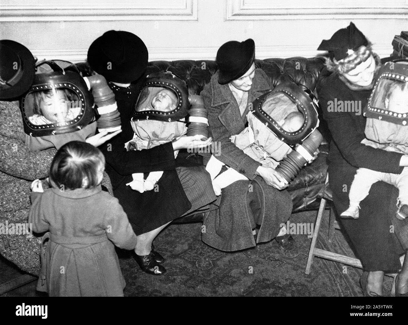 Gas masks for babies, in England, during World war two; 1940 Stock Photo