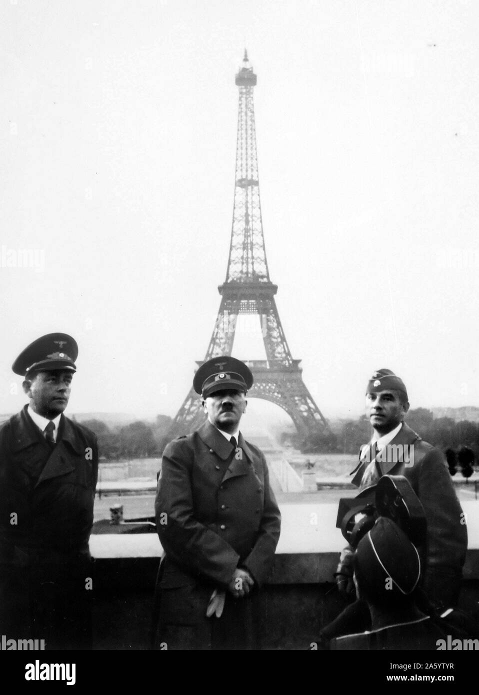 German Chancellor Adolf Hitler, with architect, Albert Speer and sculptor, Arno Breker (right), arrive in Paris following the German Invasion of France, 1940 Stock Photo