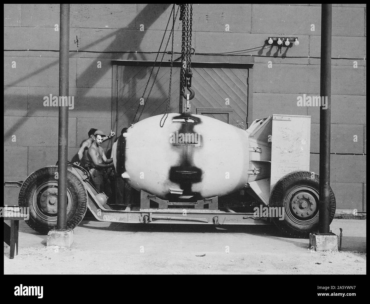 Fat Man on transport carriage, Tinian Island, 1945 'Fat Man' was the codename for the type of atomic bomb that was detonated over the Japanese city of Nagasaki by the United States on 9 August 1945. Stock Photo