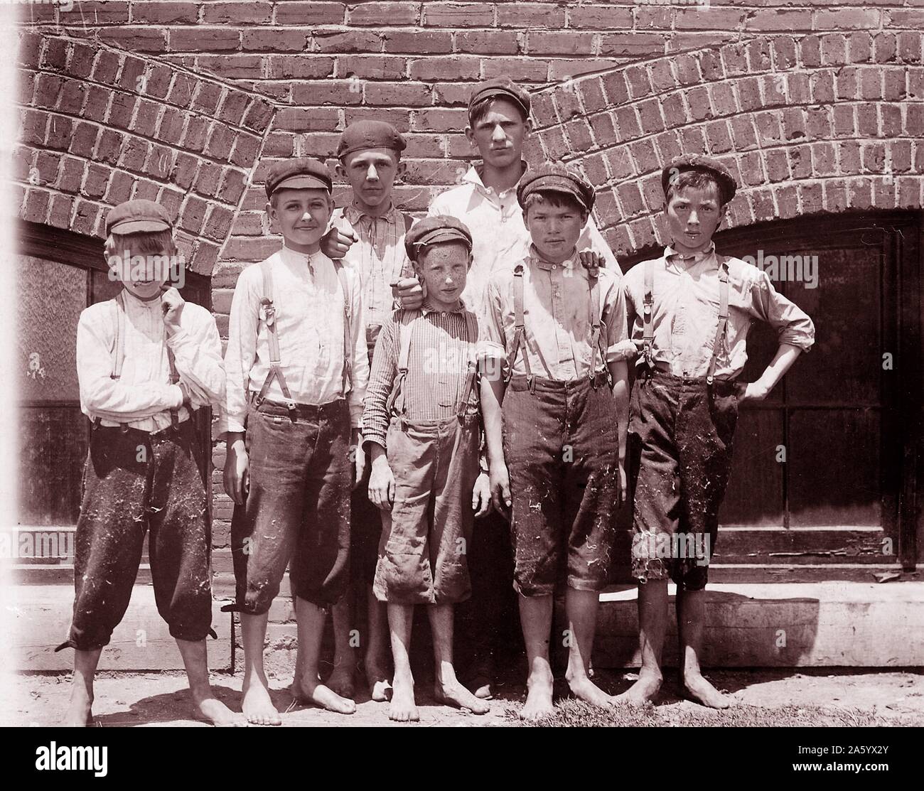 Child labour in early twentieth century USA: Doffer boys in Aragon Mills, Rock Hill, South Carolina, photographed by Lewis Hine on 13 May 1912 Stock Photo