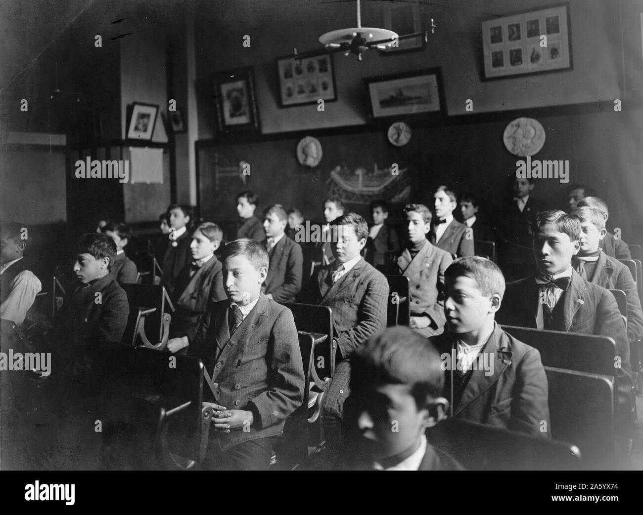 Education and school children mixed race integrated pupils in public school, New York 1913 Stock Photo