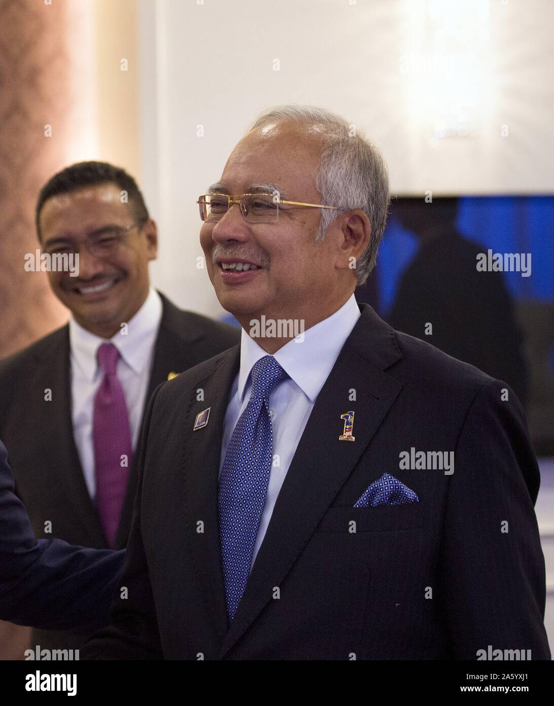 Photograph of United States Secretary of Defense Chuck Hagel (1946-) and Malaysian Prime Minister Najib Razak Def Min Hishammuddin Tun Hussein (1961-). Dated 2013 Stock Photo