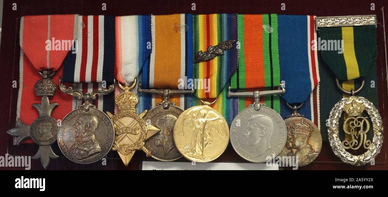 Sergeant Albert Thomas Sheldon, 5th Battalion First world war, medals and badges Medals (left to right) MBE; Military Medal;1914-15 Star; British War Medal; Allied Victory Medal; Defence Medal; King George VI Coronation Medal; Territorial Decoration; Stock Photo