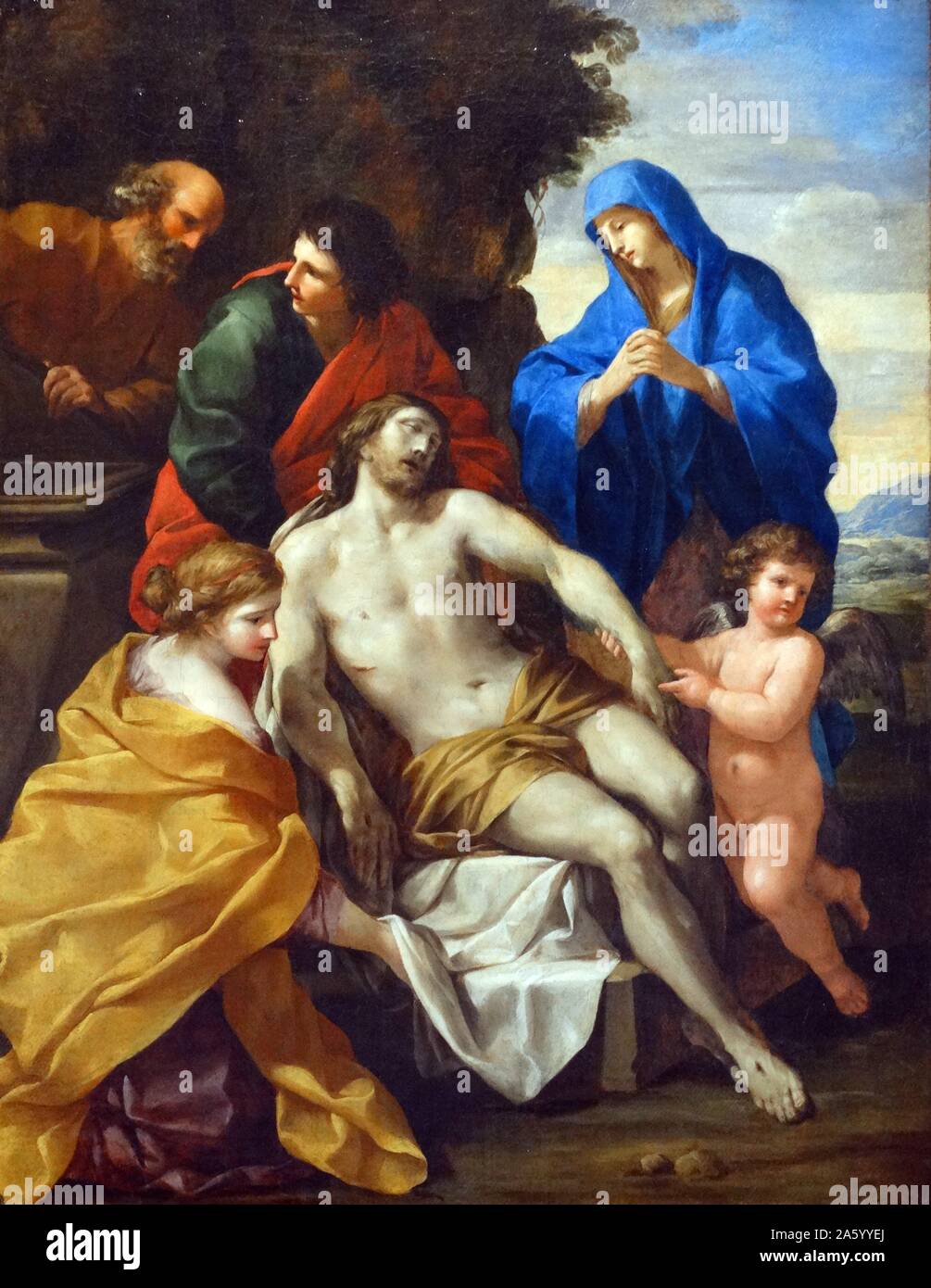 The Entombment by Giovanni Francesco Romanelli (1610-1662). Oil on canvas, c1638. Christ is wrapped in a sheet by the disciples John and Mary Magdalene. Joseph of Arimathaea prepares the stone tomb, Mary watches nearby. Stock Photo