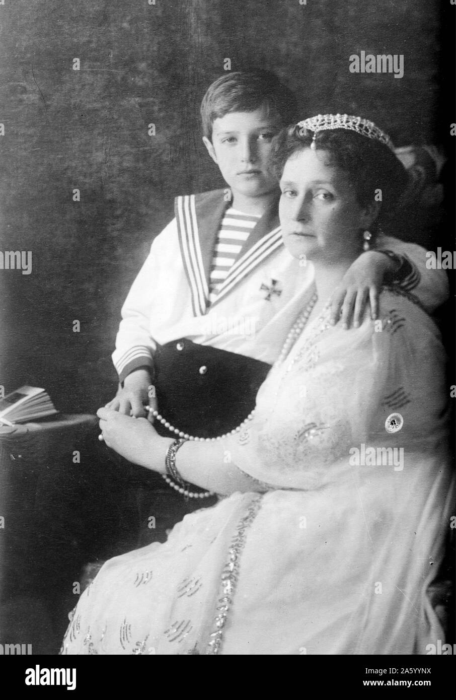 Alexandra Feodorovna Romanova (1872-1918), Empress consort of Russia and wife of Nicholas II, with her son Alexei Nikolaevich, Tsarevich of Russia (1904-1918). Stock Photo