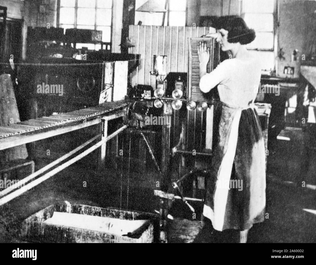 female machine operator in a pencil factory circa 1925 Stock Photo Alamy