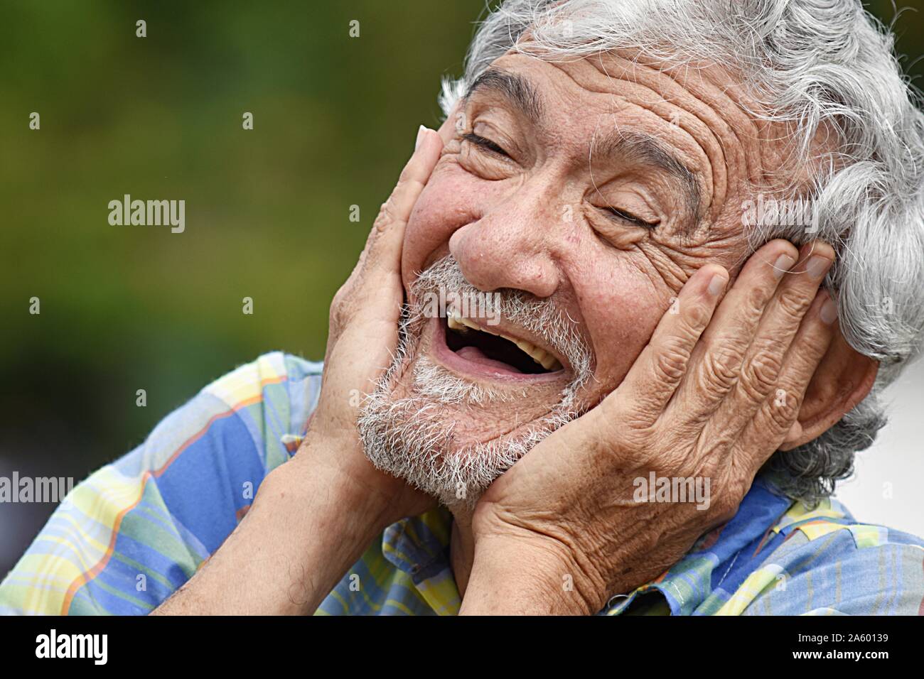 An Old Male And Laughter Stock Photo