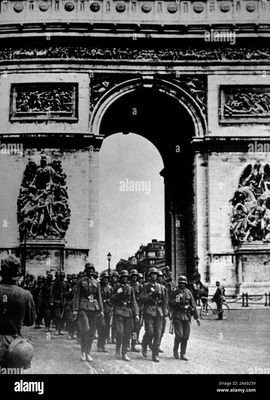 German army marches by the Arc de Triomphe; Paris during the occupation of France, in world war two. 1940 Stock Photo