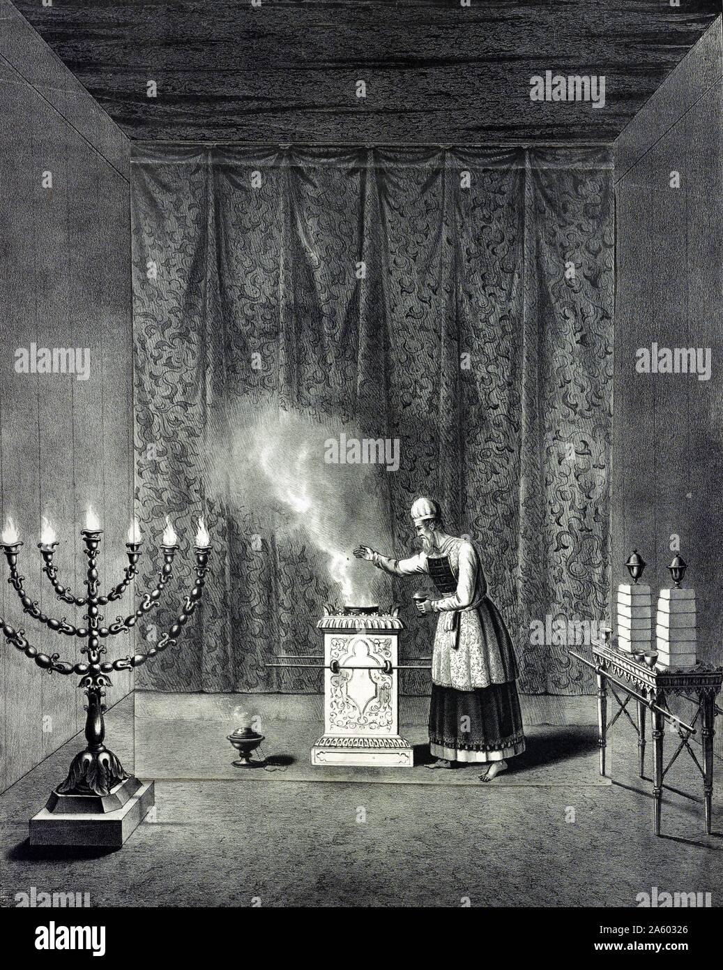 The holy place by John Henry Camp (1822-1881). Lithograph with overlay, print shows, at centre, a priest putting incense into a center on 'The Altar of Incense', a large portable stand with carrying rods on two sides;a small censer sits on the floor nearby. On the left is 'The Golden Candlestick' and on the right is 'The Table of Shewbread'. Stock Photo