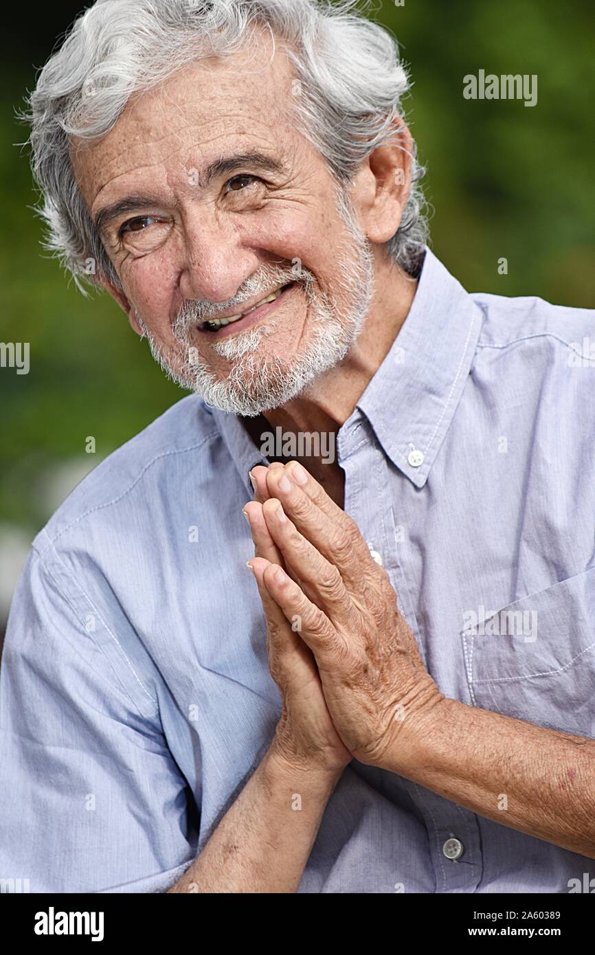 Retired grandpa praying hi-res stock photography and images - Alamy