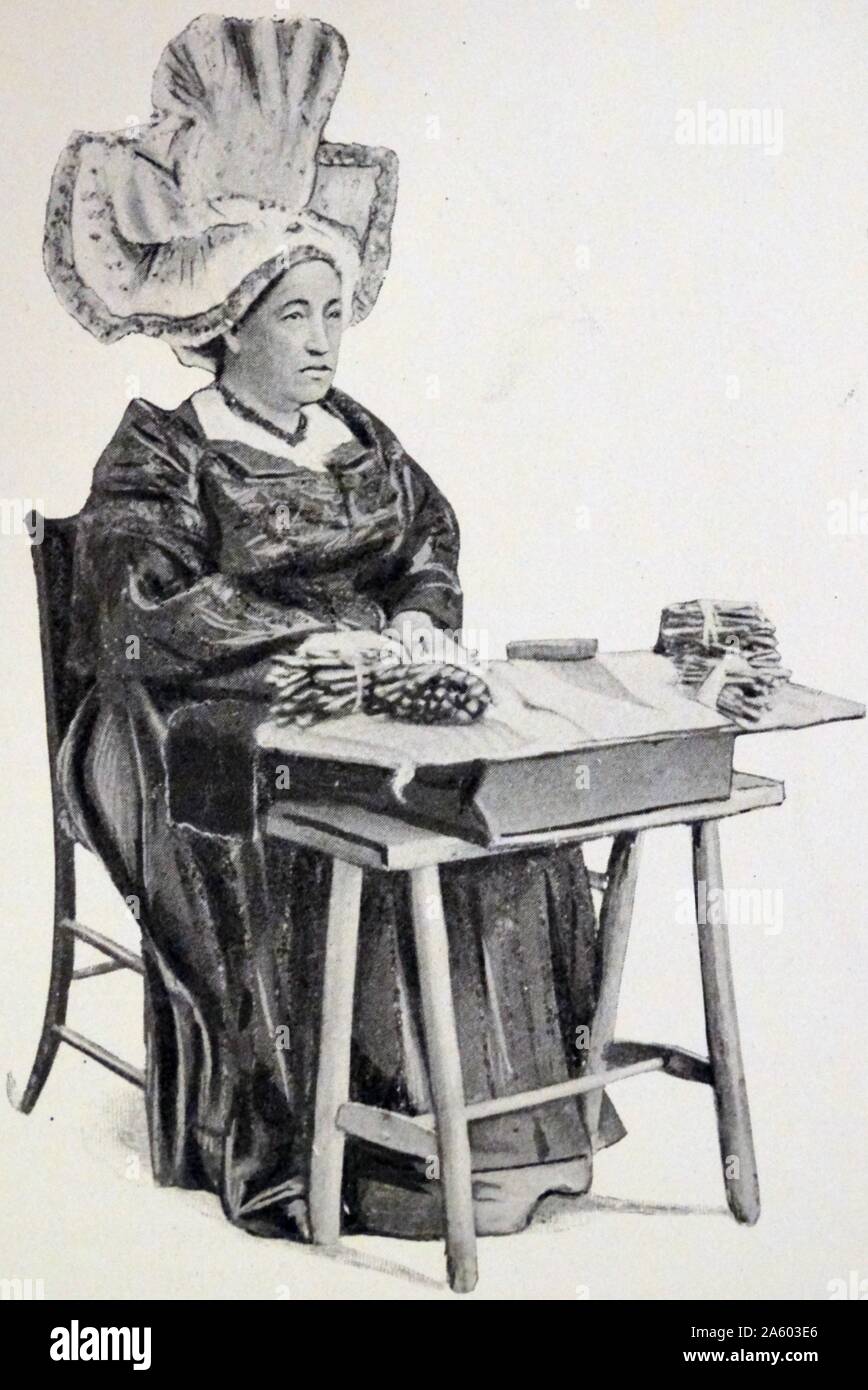 Print of a woman wearing a Norman Head-Dress. Dated 19th Century Stock Photo