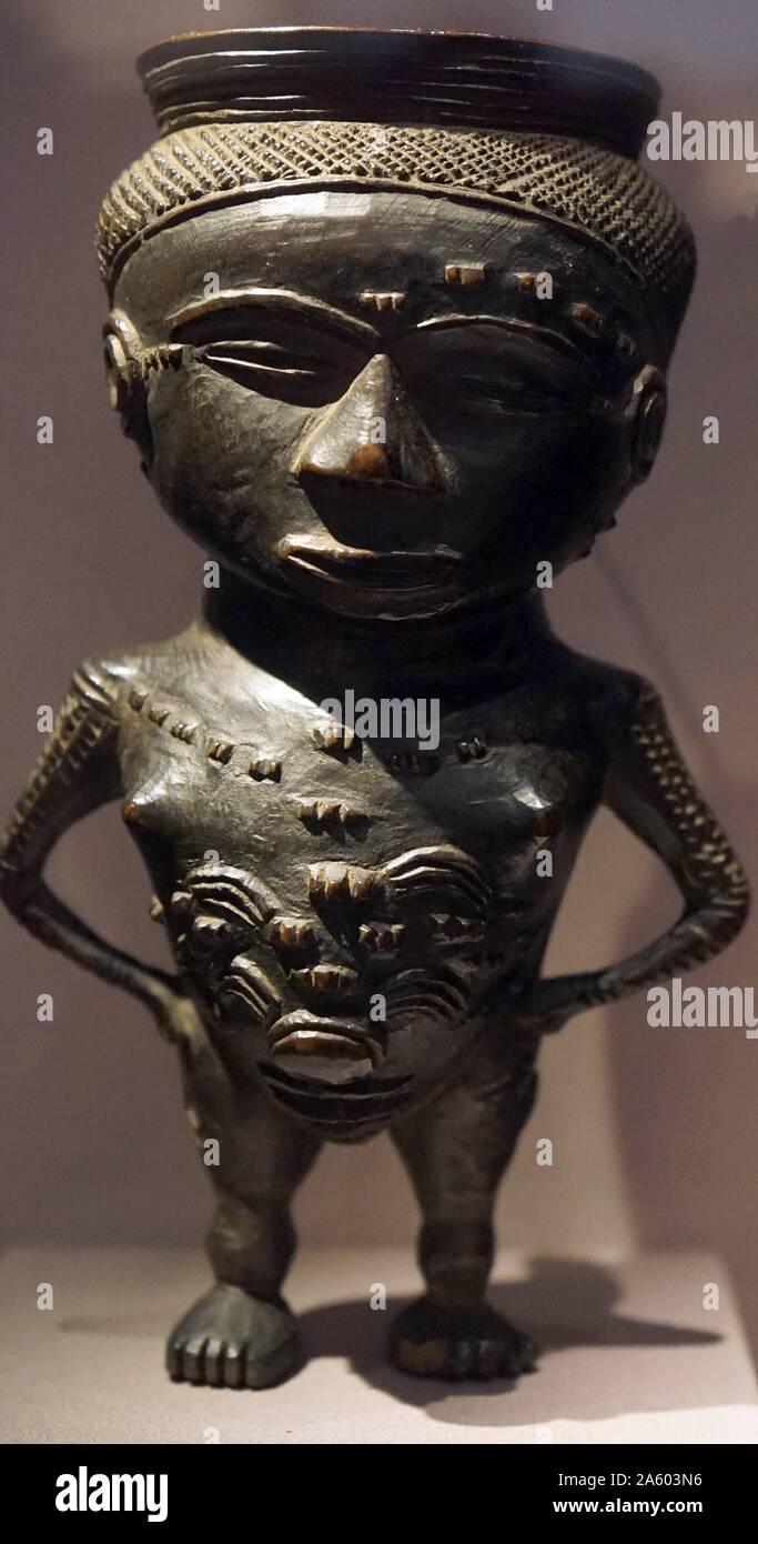 Carved wooden cup in female form from Central Africa. Dated 20th Century Stock Photo