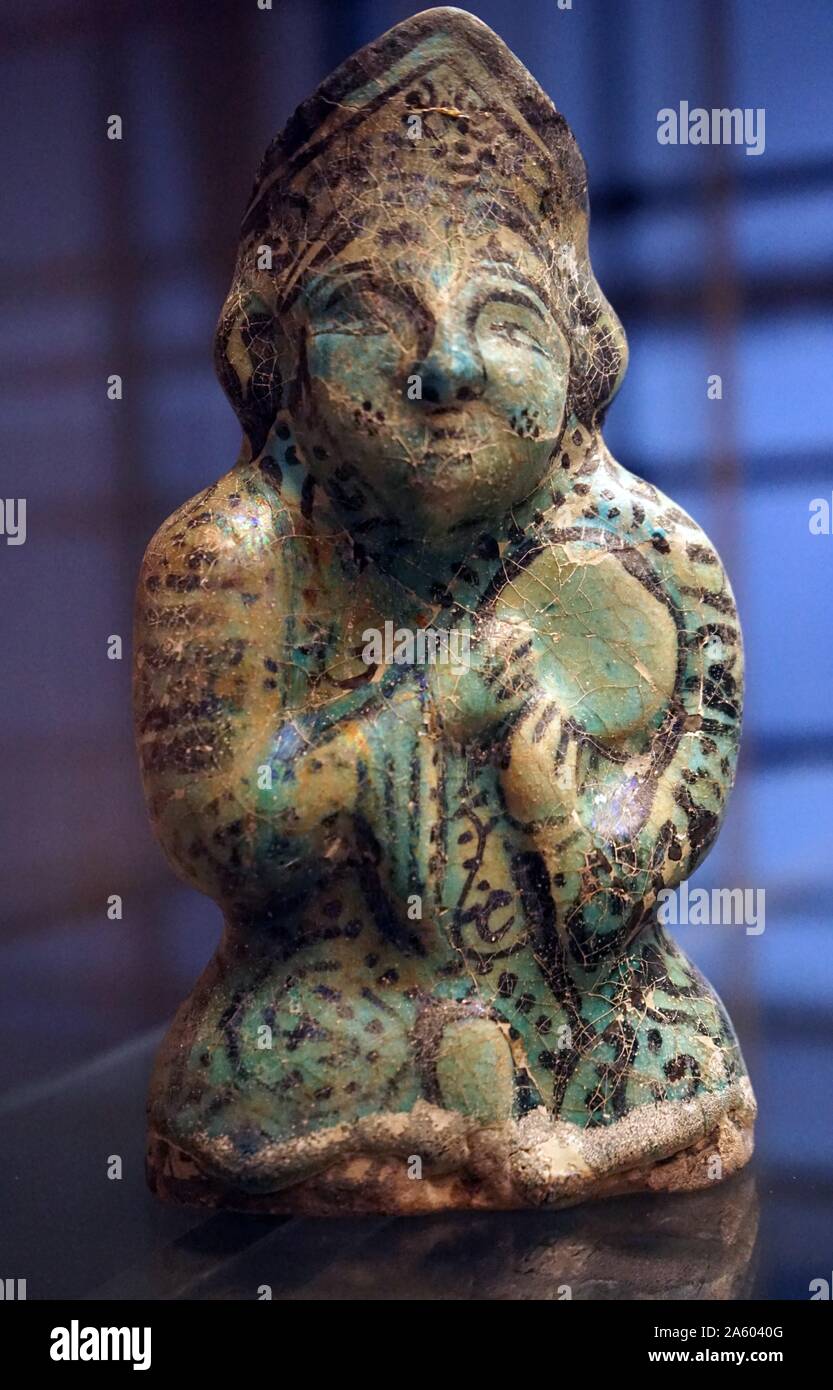 Iranian vase in the form of a musician. Dated 13th Century Stock Photo