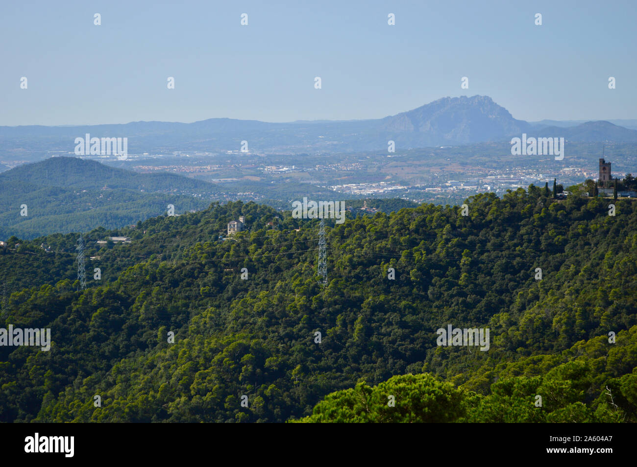 The Serra de Collserola mountain range viewed from Tibidabo in Barcelona, Spain Stock Photo