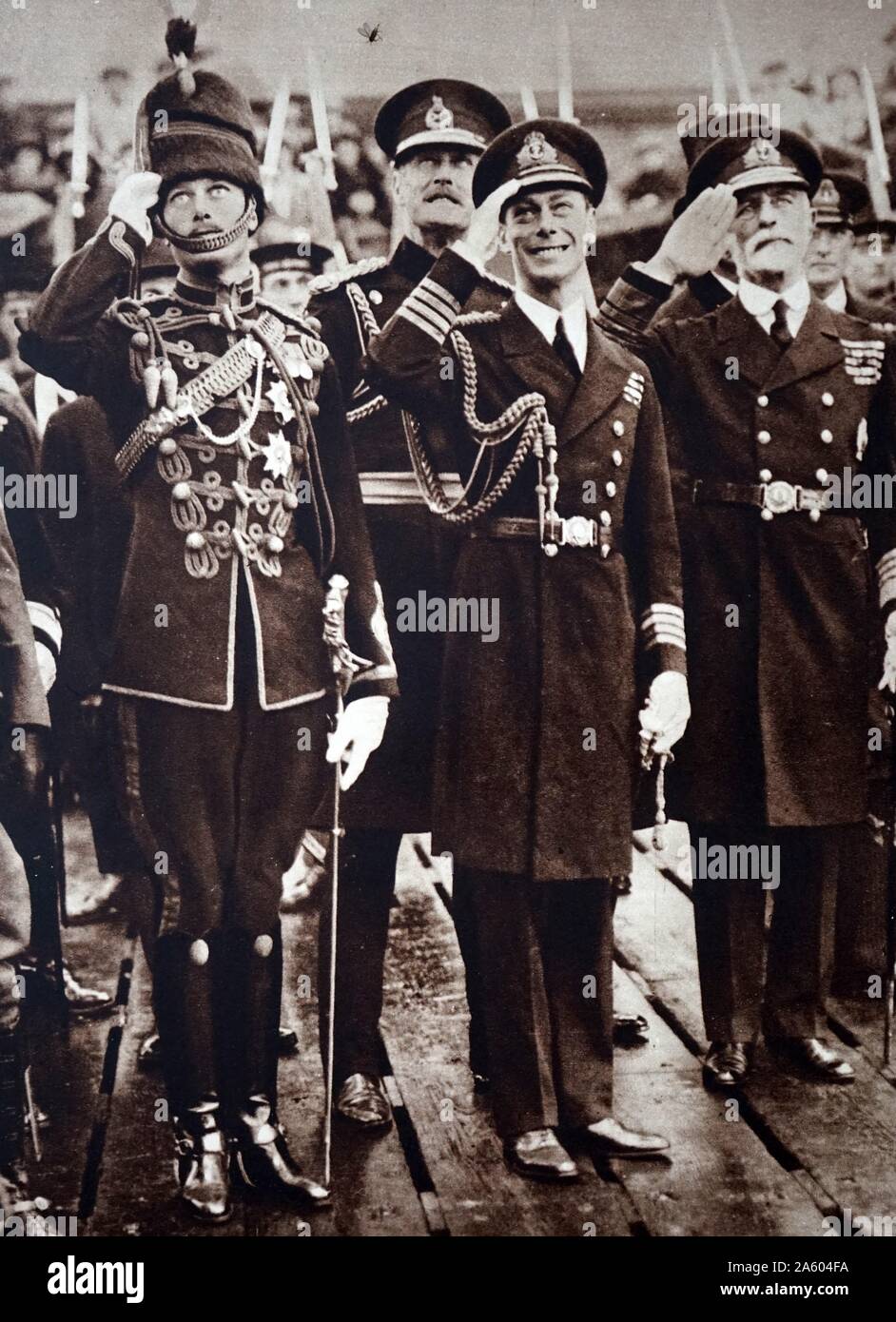 Photograph of Prince Albert Frederick Arthur George (1895-1952) and Prince Henry, Duke of Gloucester (1900-1974) awaiting the return of their brother, of Edward, Prince of Wales (1894-1972) Dated 20th Century Stock Photo