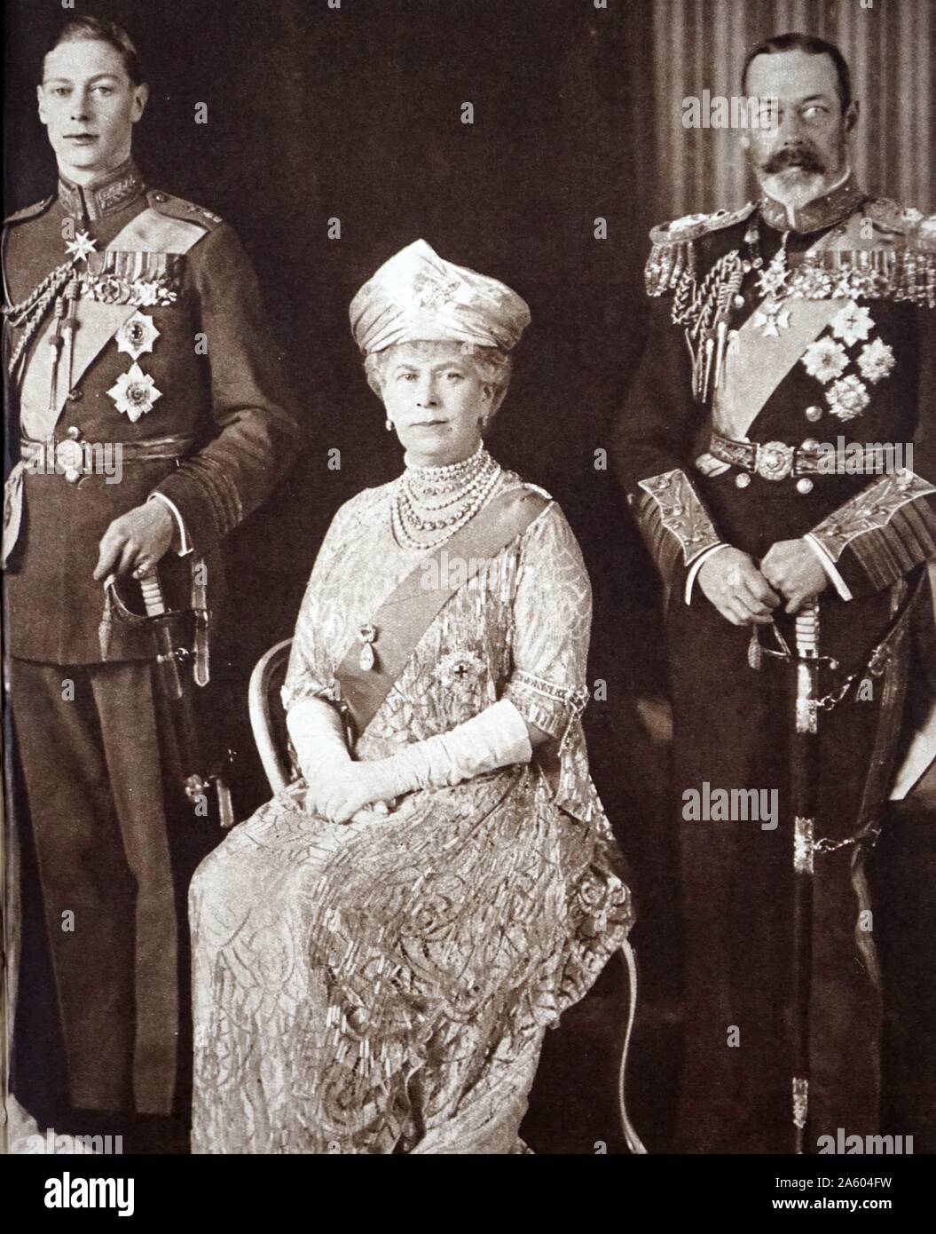 Photograph of Prince Albert Frederick Arthur George (1895-1952) pictured with Queen Mary of Teck (1867-1953) and King George V (1865-1936) on his wedding day . Dated 20th Century Stock Photo