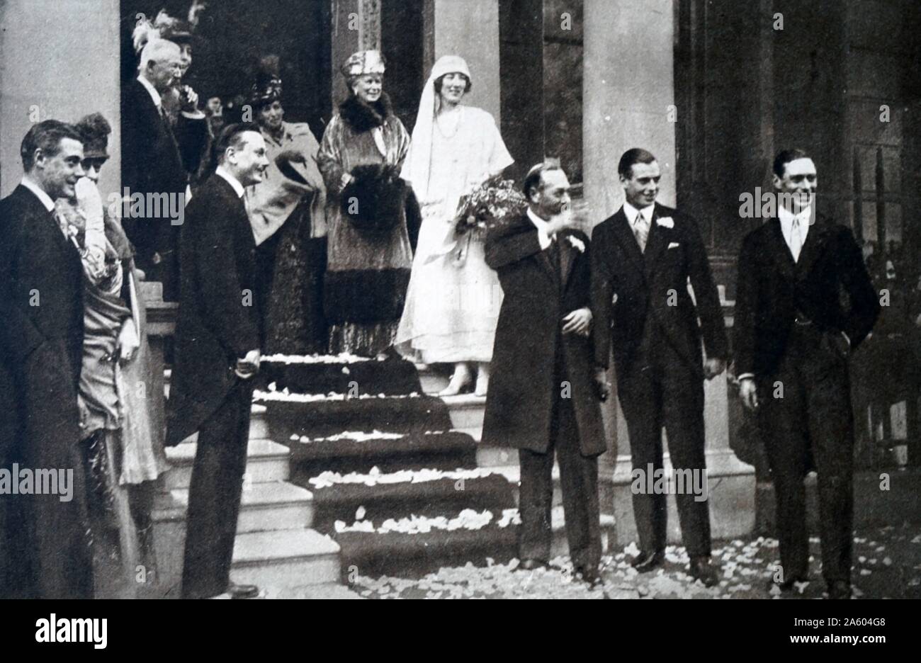 Photograph taken during the wedding of Maud of Wales (1869-1938) and King Haakon VII (1872-1957). Also pictured is King George V (1865-1936), Queen Elizabeth The Queen Mother (1900-2002), Alexandra of Denmark (1844-1925) and Queen Mary of Teck (1867-1953). Dated 20th Century Stock Photo