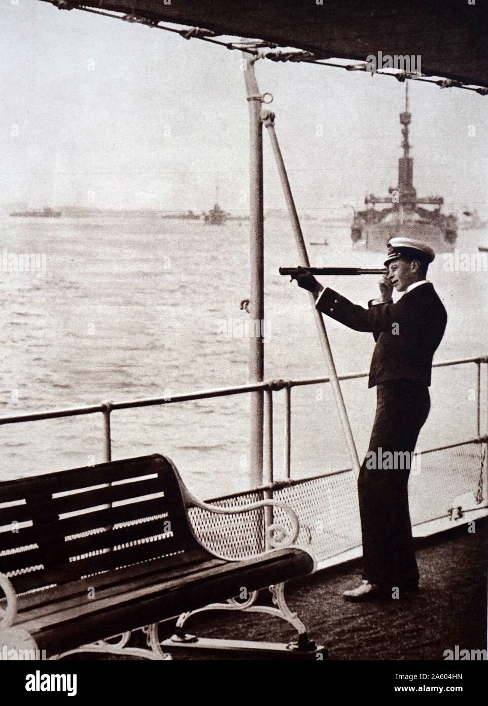 Photograph of Prince Albert Frederick Arthur George (1895-1952) as a midshipman in the gun-room of H.M.S. Collingwood. Dated 20th Century Stock Photo