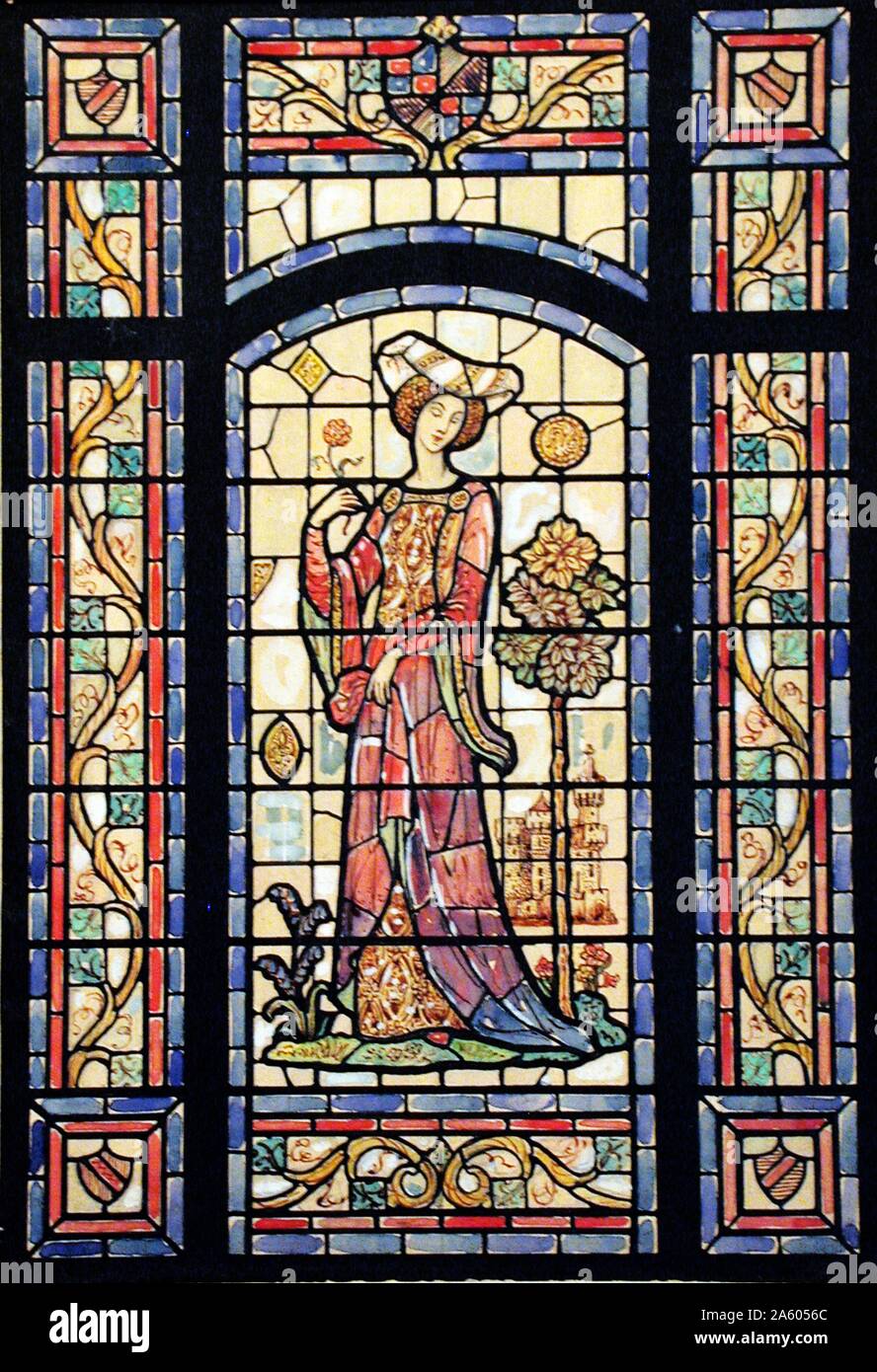 A stained glass window for C.F. Bohn Residence in Grosse Pointe, Michigan. It shows a romantic Medieval lady with headdress. 1911 Stock Photo
