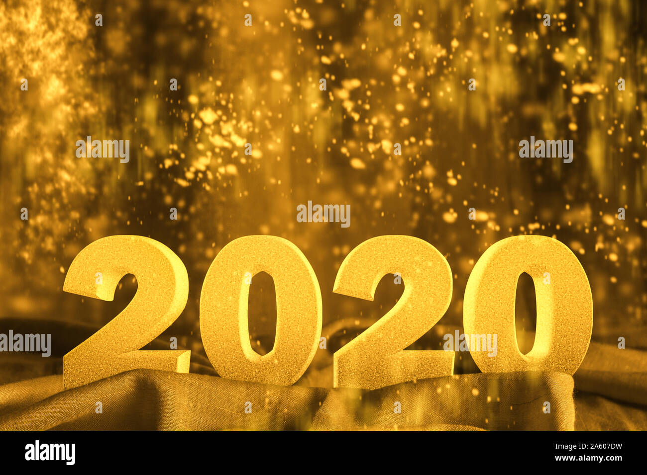 Happy New year 2020 3D text with glitter golden yellow color  -celebration and holidays concept image with copy space for text. Stock Photo