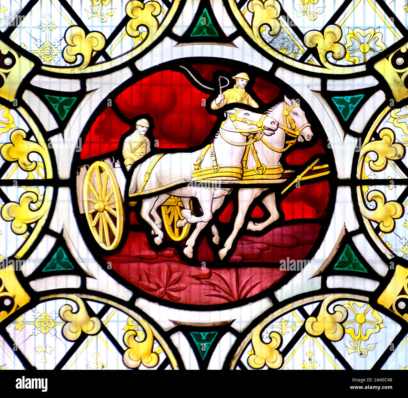 London, England, UK. Stained glass window in St James Roman Catholic Church, George Street/Spanish Place, Marylebone. WW1 soldeiers with a horse-drawn Stock Photo