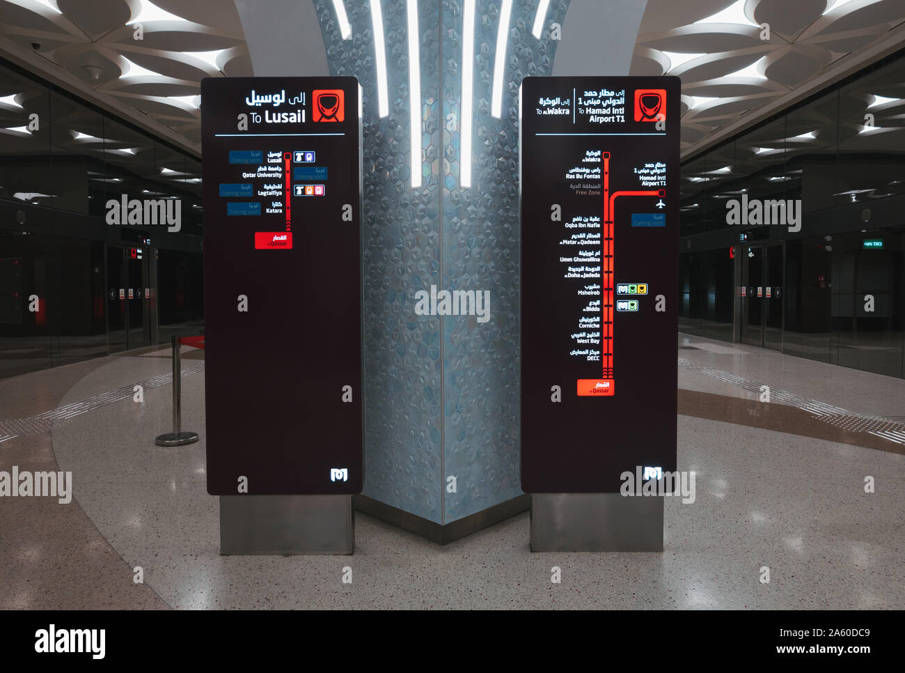 Signs show the route map of the train from Lusail to Al Wakra and Hamad  Airport on the platform of the Doha Metro, Qatar Stock Photo - Alamy