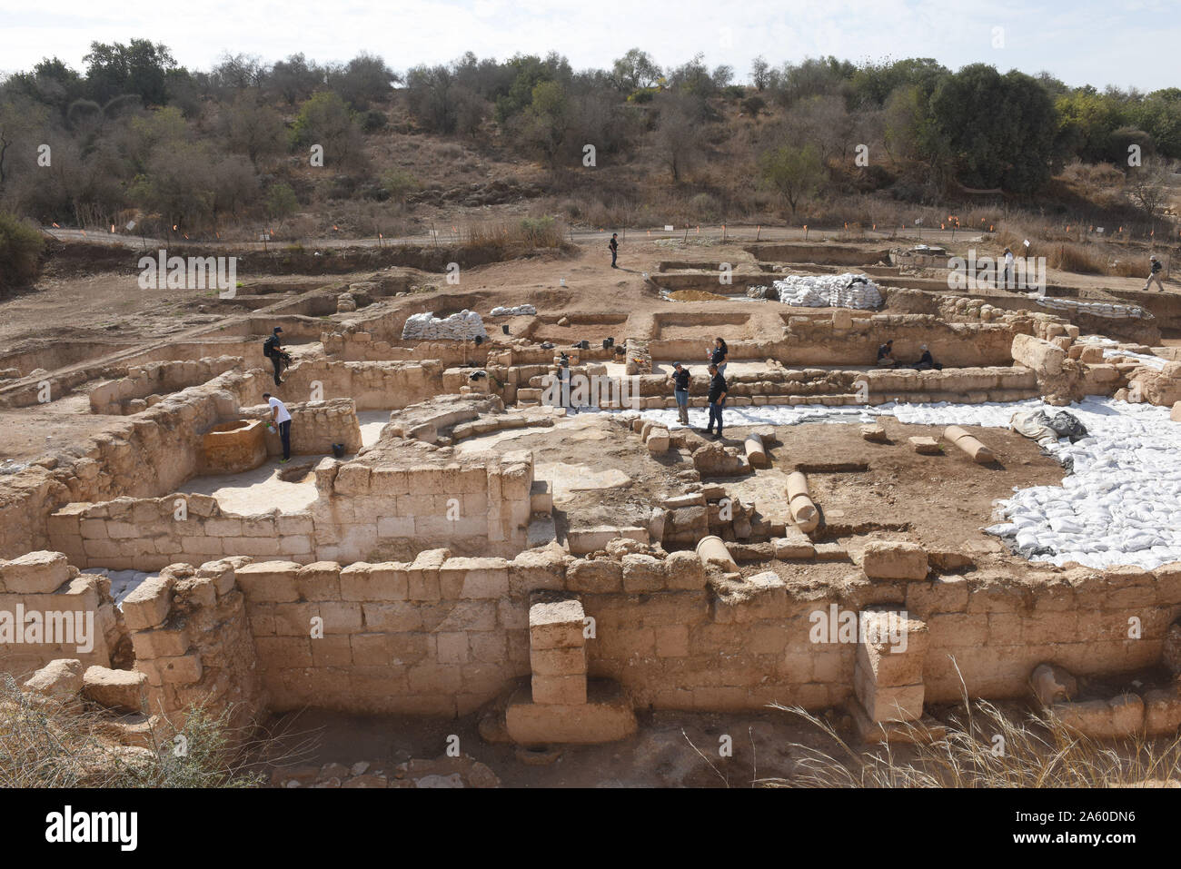 Ramat Beit Shemesh, Israel. 23rd Oct, 2019. Workers from the Israel Antiquities Authority remove dirt from an excavated 1,500 year old Byzantine church in Ramat Beit Shemesh, on Wednesday, October 23, 2019. The three years excavations uncovered the church, Greek inscriptions, mosaics, a baptismal and a crypt of an unknown glorious martyr. Photo by Debbie Hill/UPI Credit: UPI/Alamy Live News Stock Photo