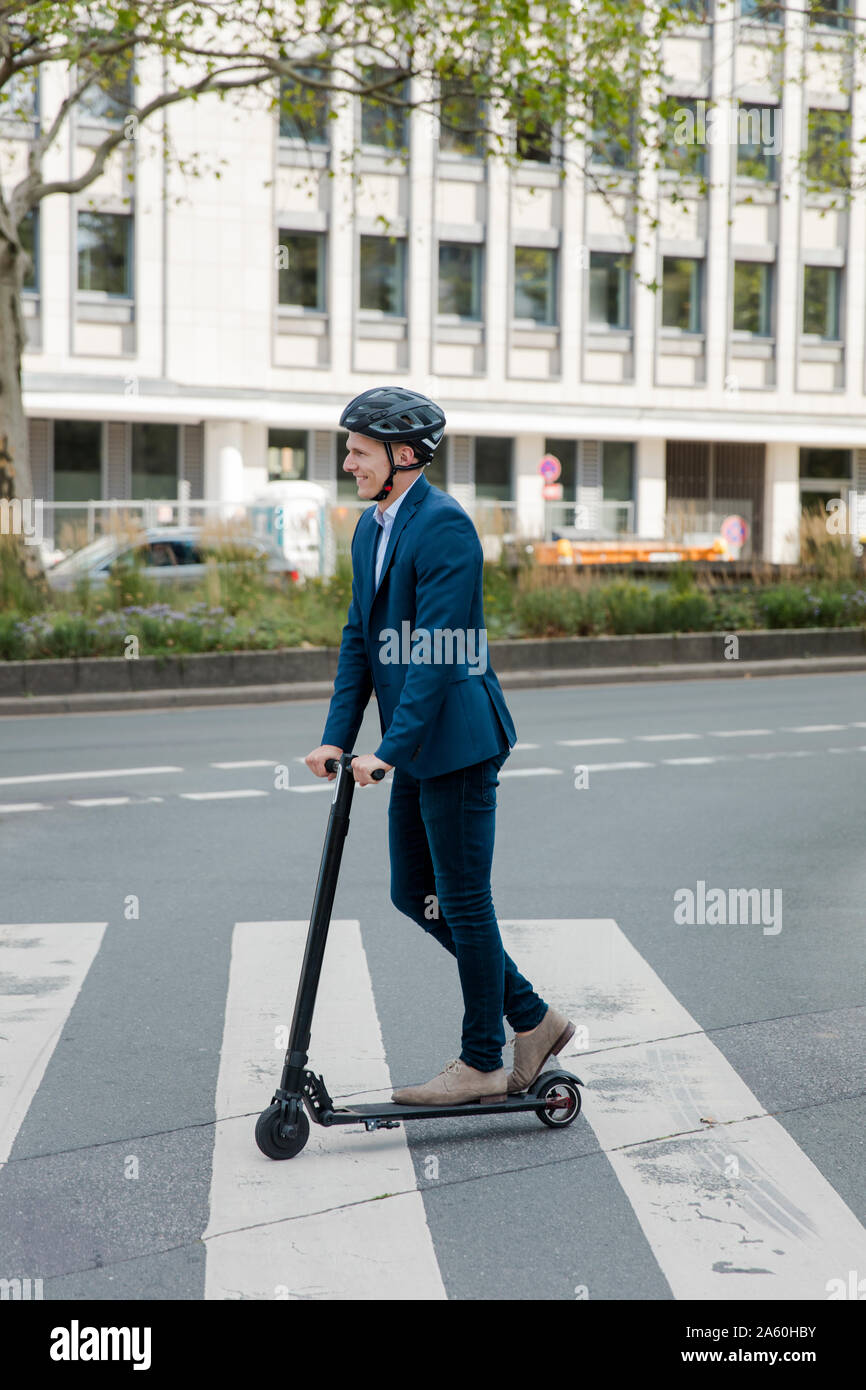 Riding e scooter helmet hi-res stock photography and images - Alamy