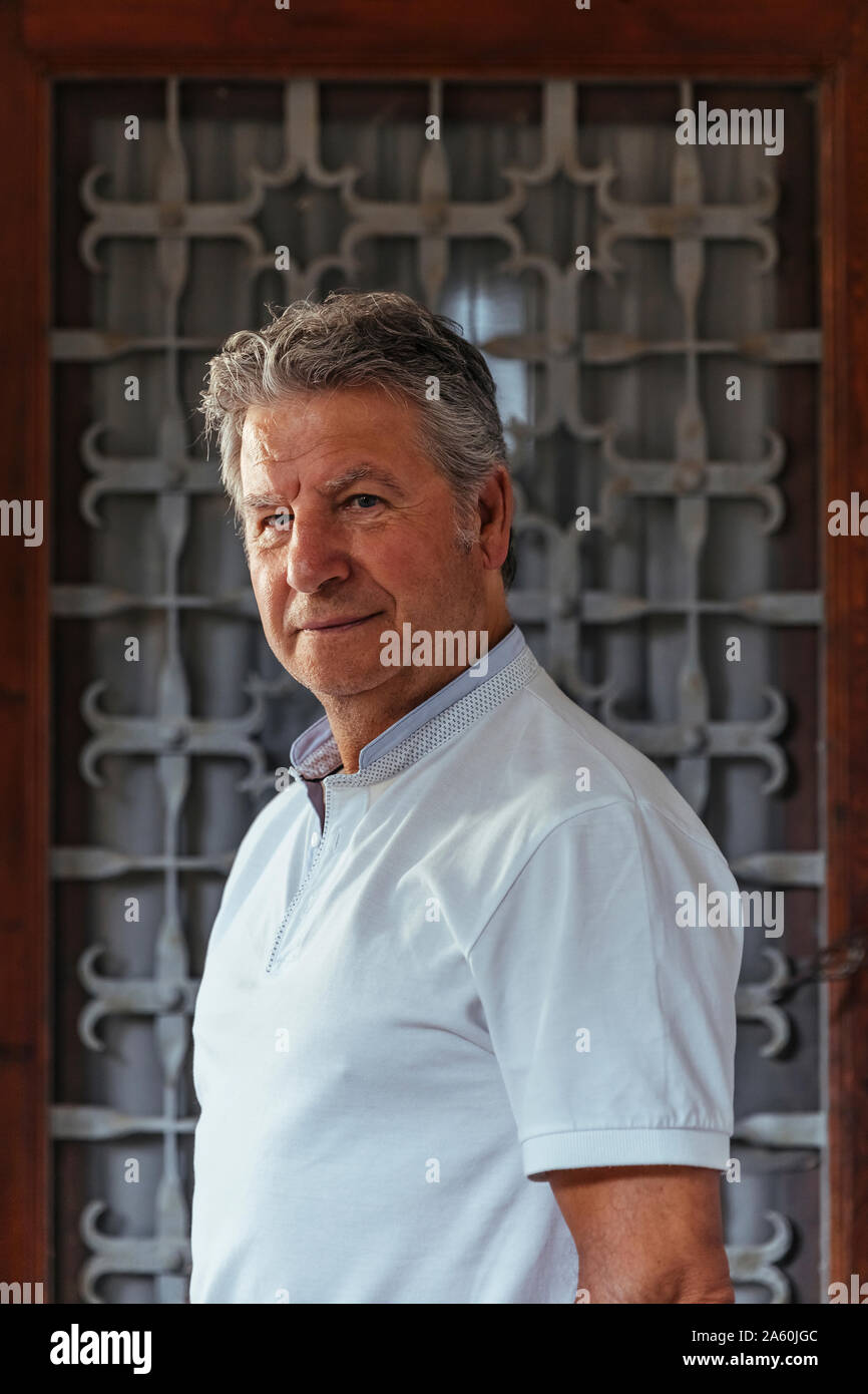 Man standing in front of gate hi-res stock photography and images - Alamy