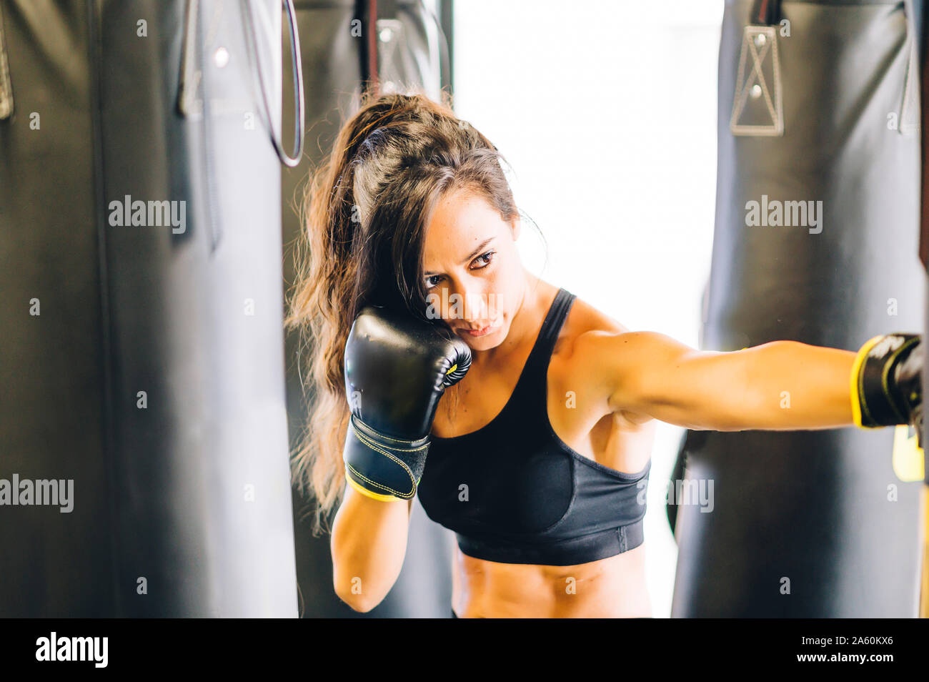 Female boxer training in gym Stock Photo
