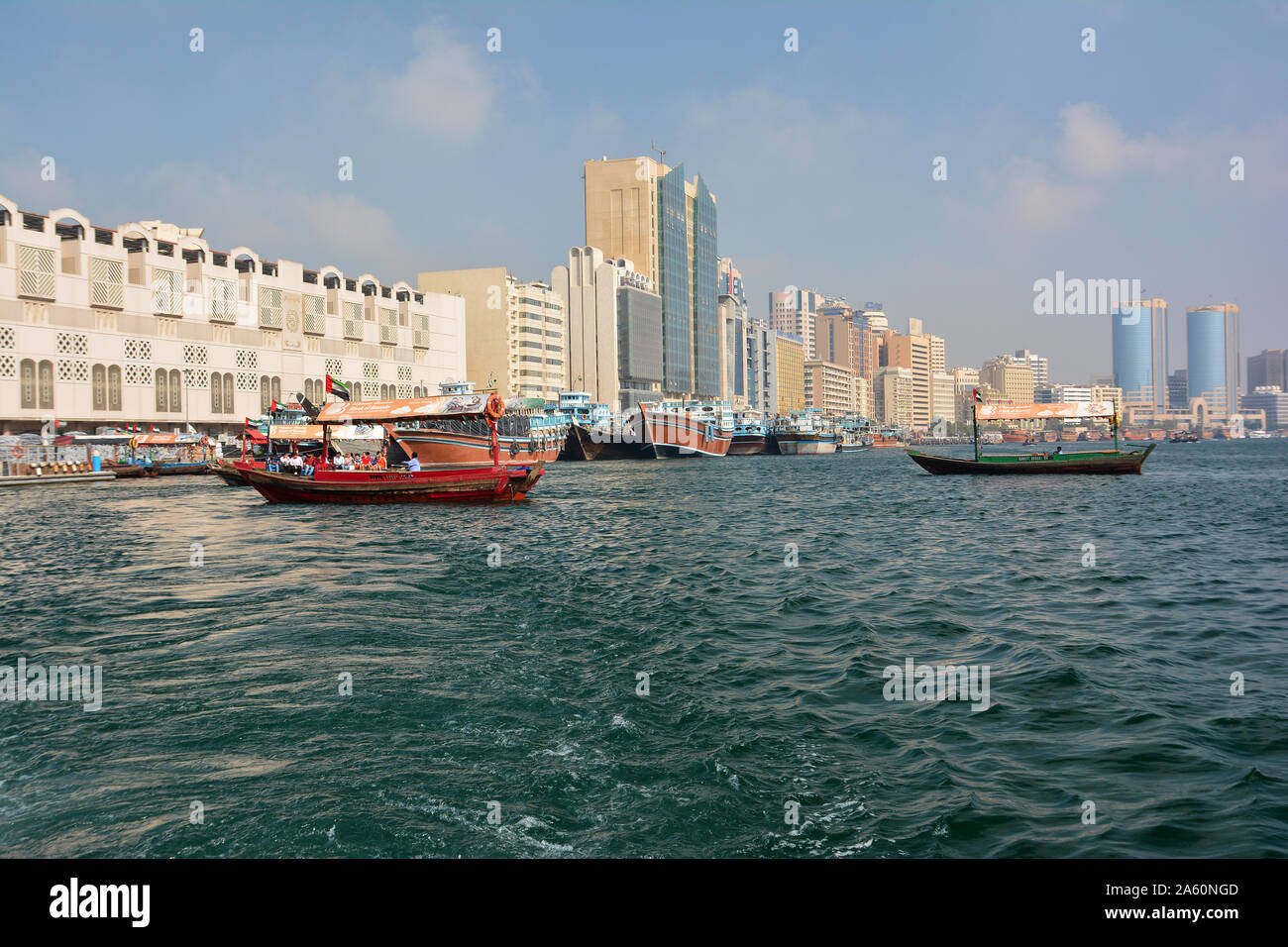 DUBAI, UNITED ARAB EMIRATES - DECEMBER 7, 2016: View of Dubai Creek with traditional water taxi boats. Gulf of Dubai, UAE. Stock Photo