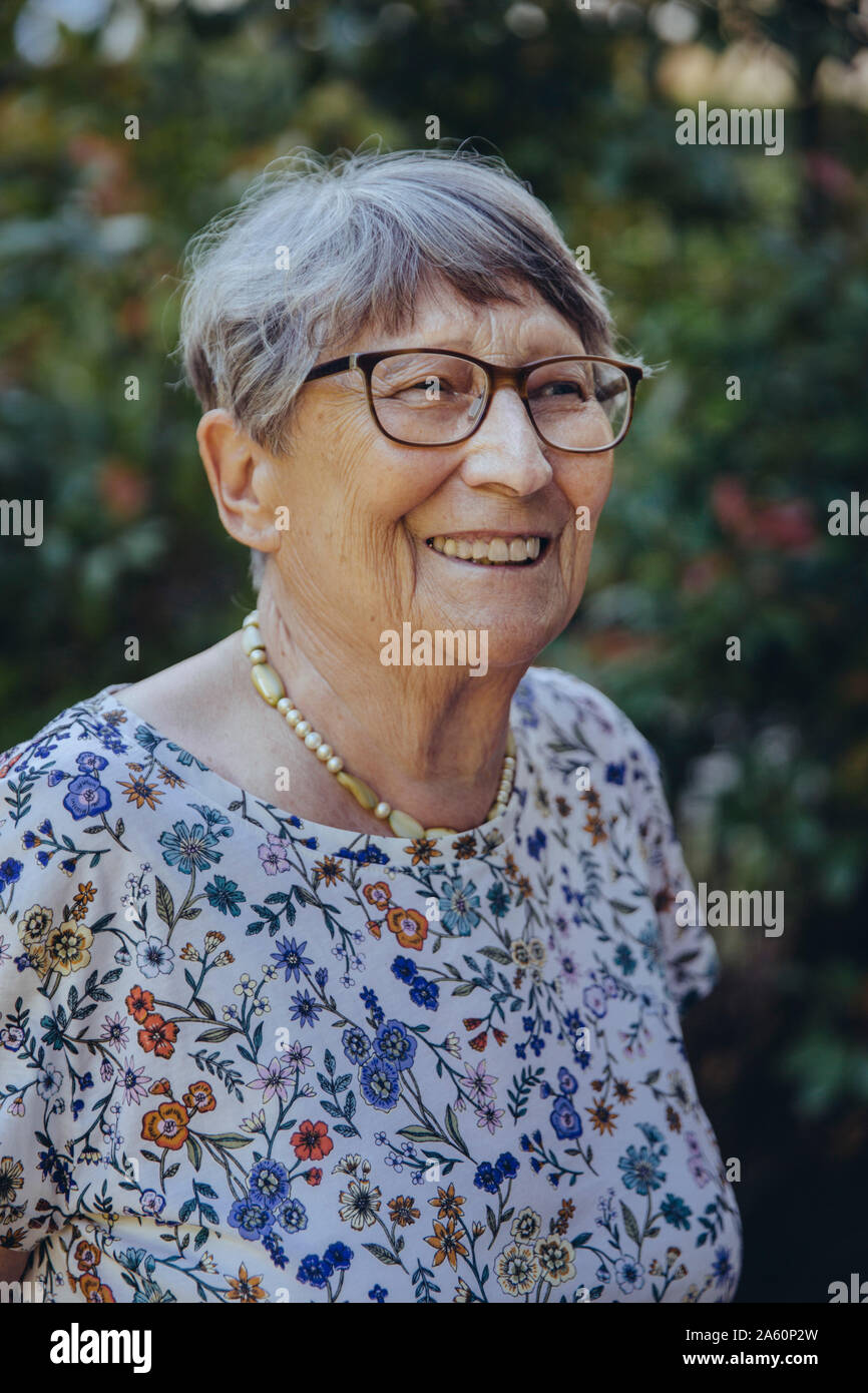 Portrait of a smiling senior woman Stock Photo - Alamy