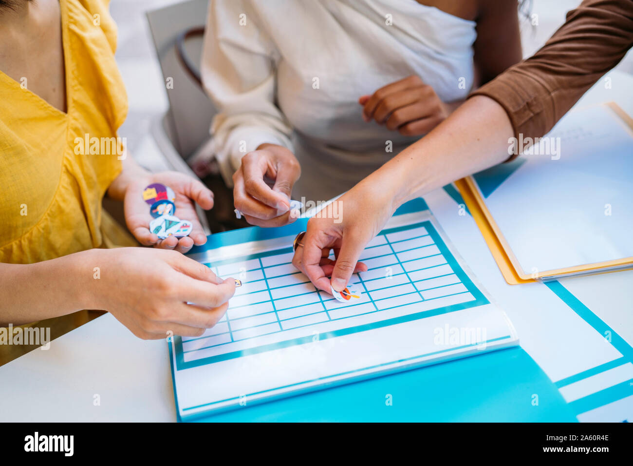 Close-up of female students organizing their class schedule Stock Photo