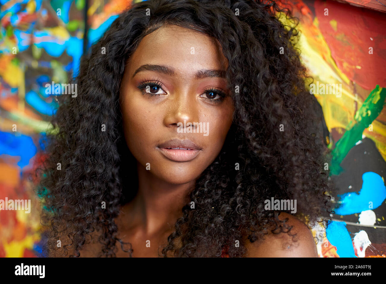 African woman painting hi-res stock photography and images - Alamy