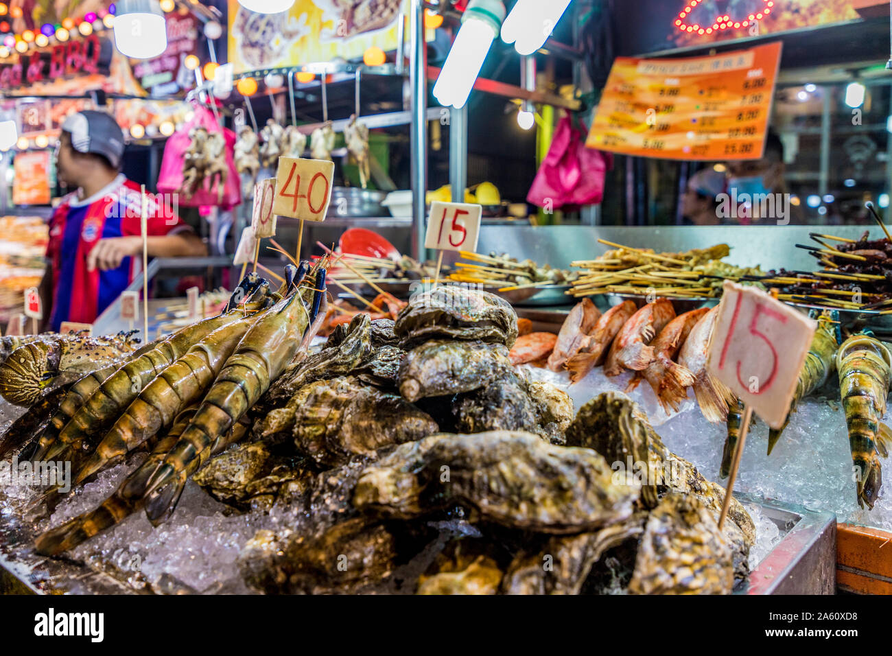Fresh fish market stall at Jalan Alor Night Food Market in Kuala Lumpur