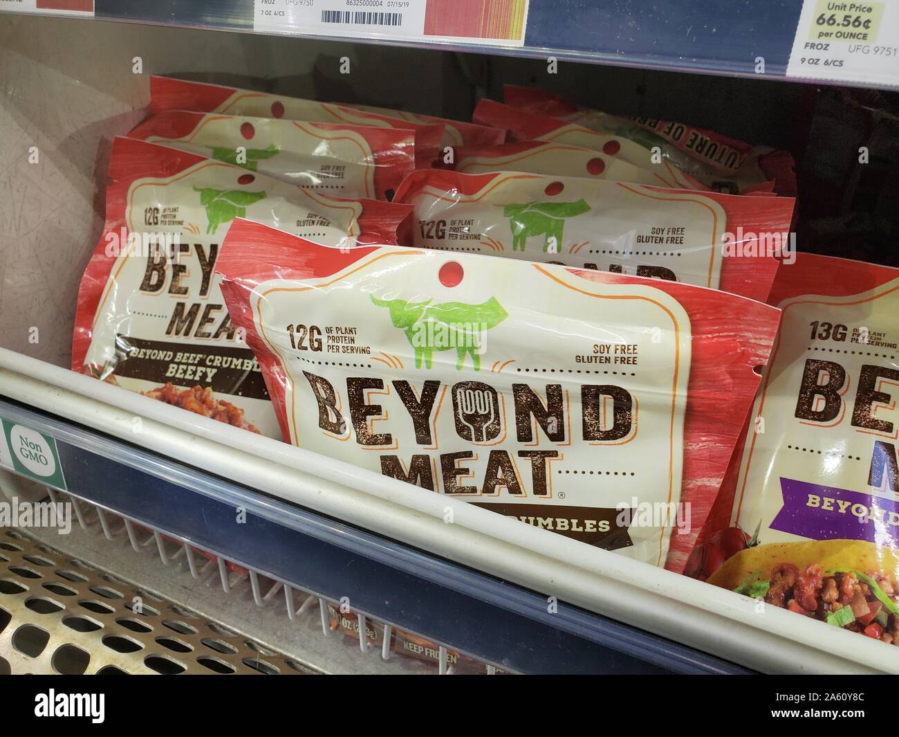 Engineered plant-based frozen crumbles from food company Beyond Meat are visible on shelves among other meat alternatives at a grocery store in San Ramon, California, September 3, 2019. () Stock Photo