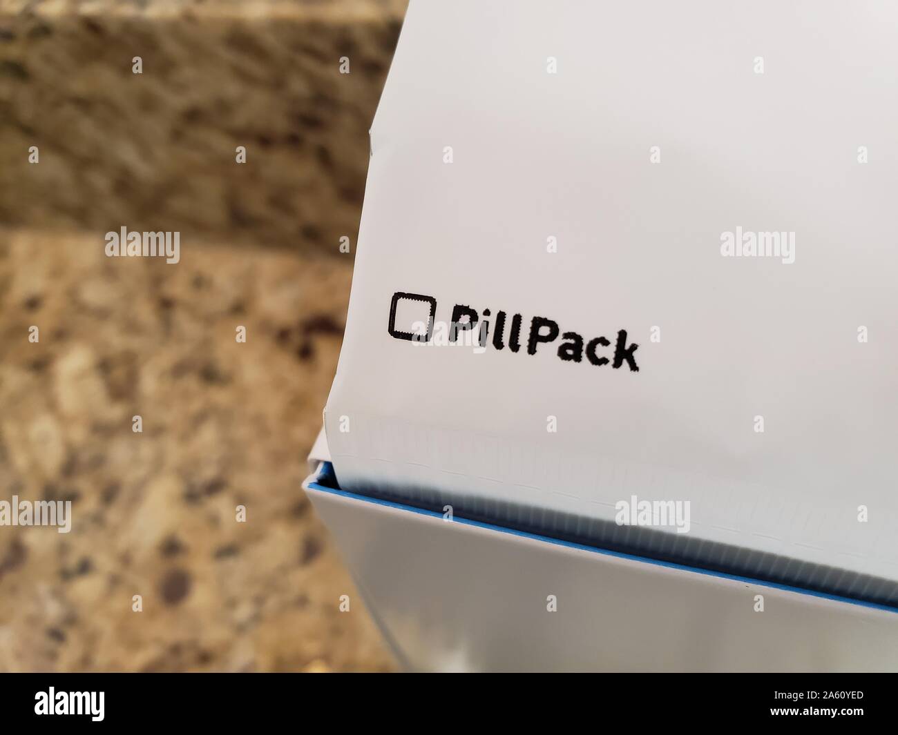 Close-up of logo for technology-driven mail order pharmacy Pillpack, acquired by Amazon, on a medication dispenser in a domestic room, September 9, 2019. () Stock Photo