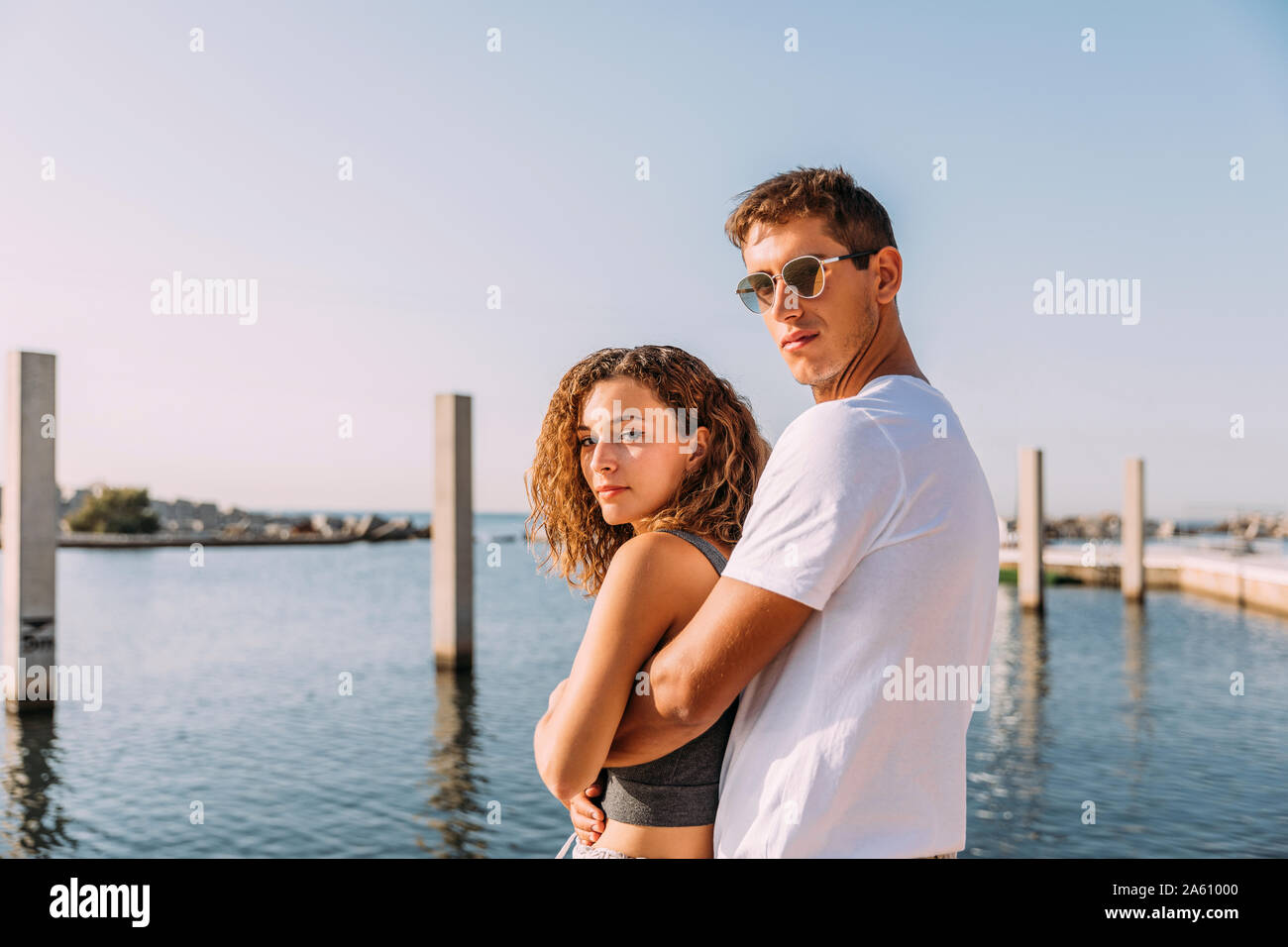 Beautiful young couple hugging hi-res stock photography and images - Alamy