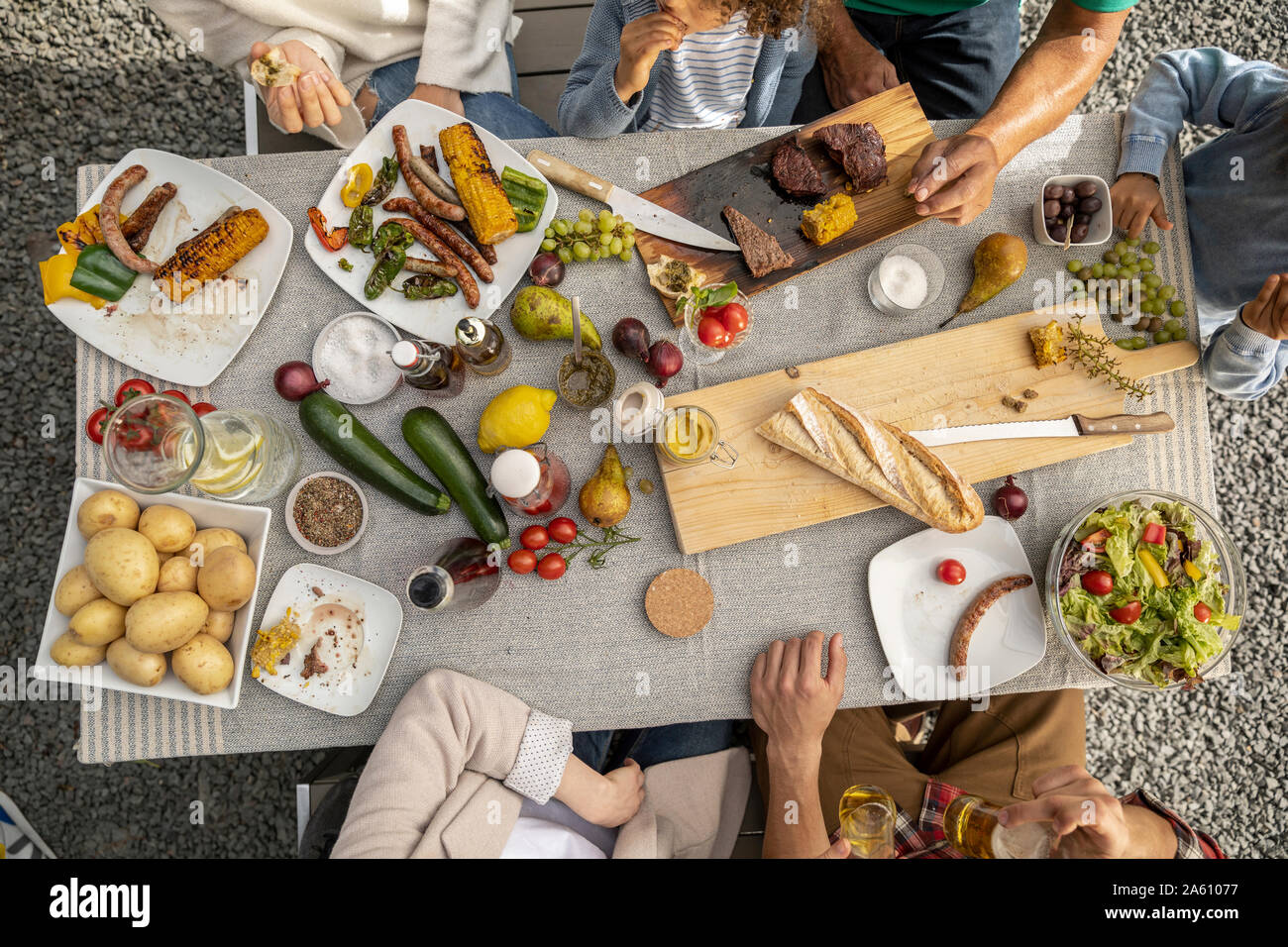 Top view of family having lunch in garden Stock Photo