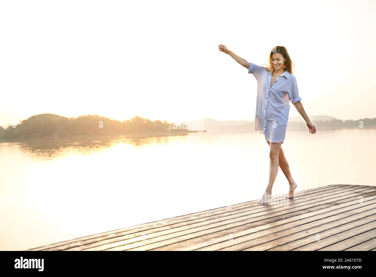 Mature woman barefoot outdoors hi-res stock photography and images - Alamy