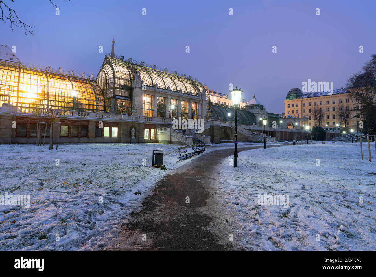 Palmenhaus greenhouse view from the Hofburg palace gardens covered with snow, Burggarten, Vienna, Austria, Europe Stock Photo
