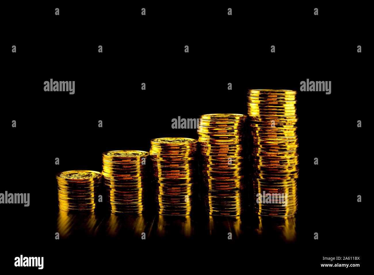 Lots of stacking gold coin at black background Stock Photo Alamy