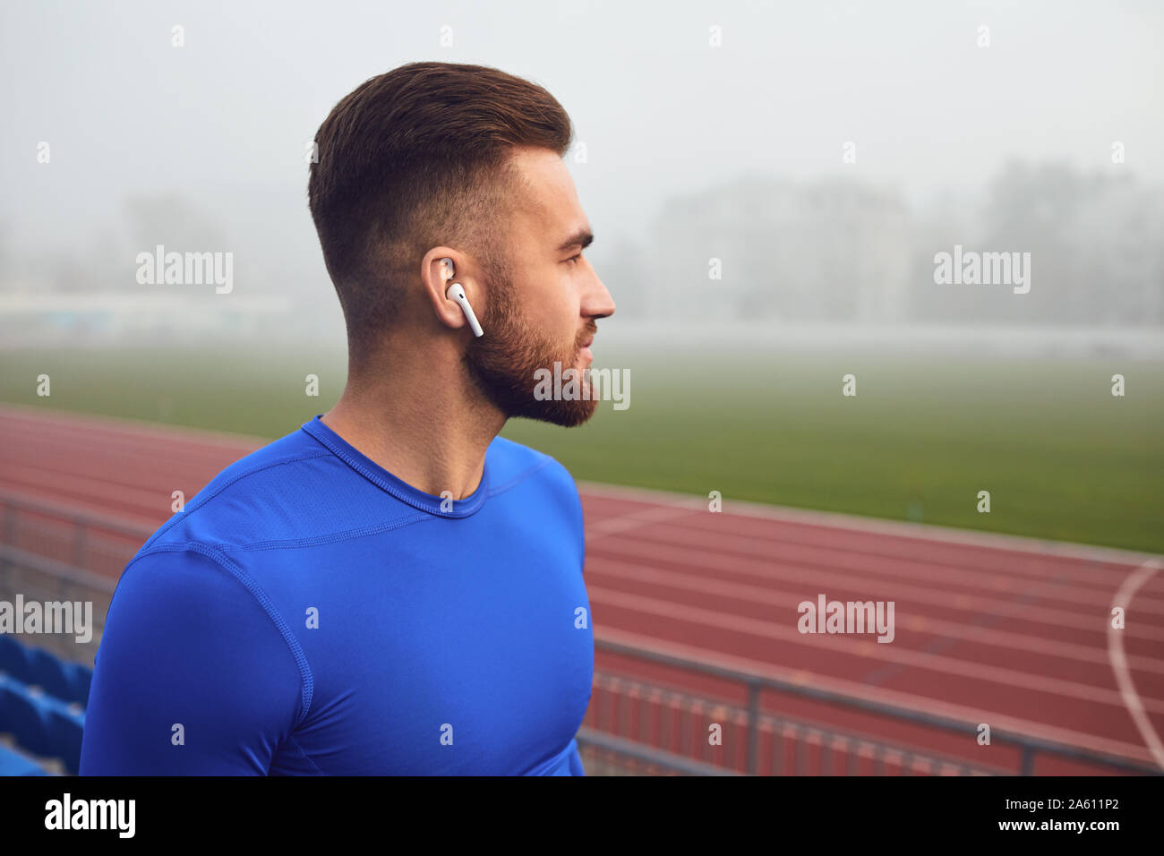Young man headphones looks hi-res stock photography and images - Alamy